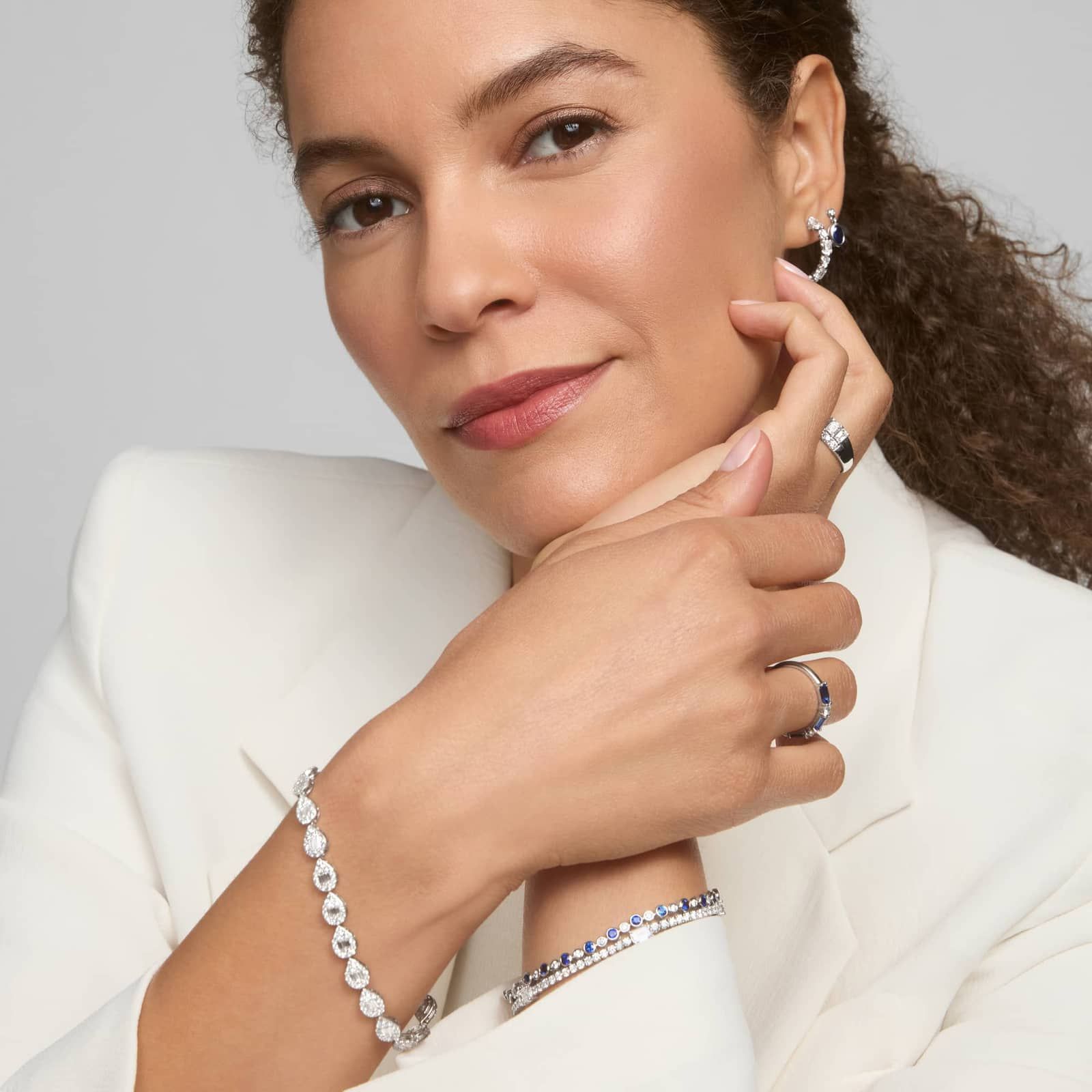 Alternating Blue Sapphire and Diamond Bracelet with 0.75 CTW Round Cut Diamonds in 14K White Gold Bezel Setting