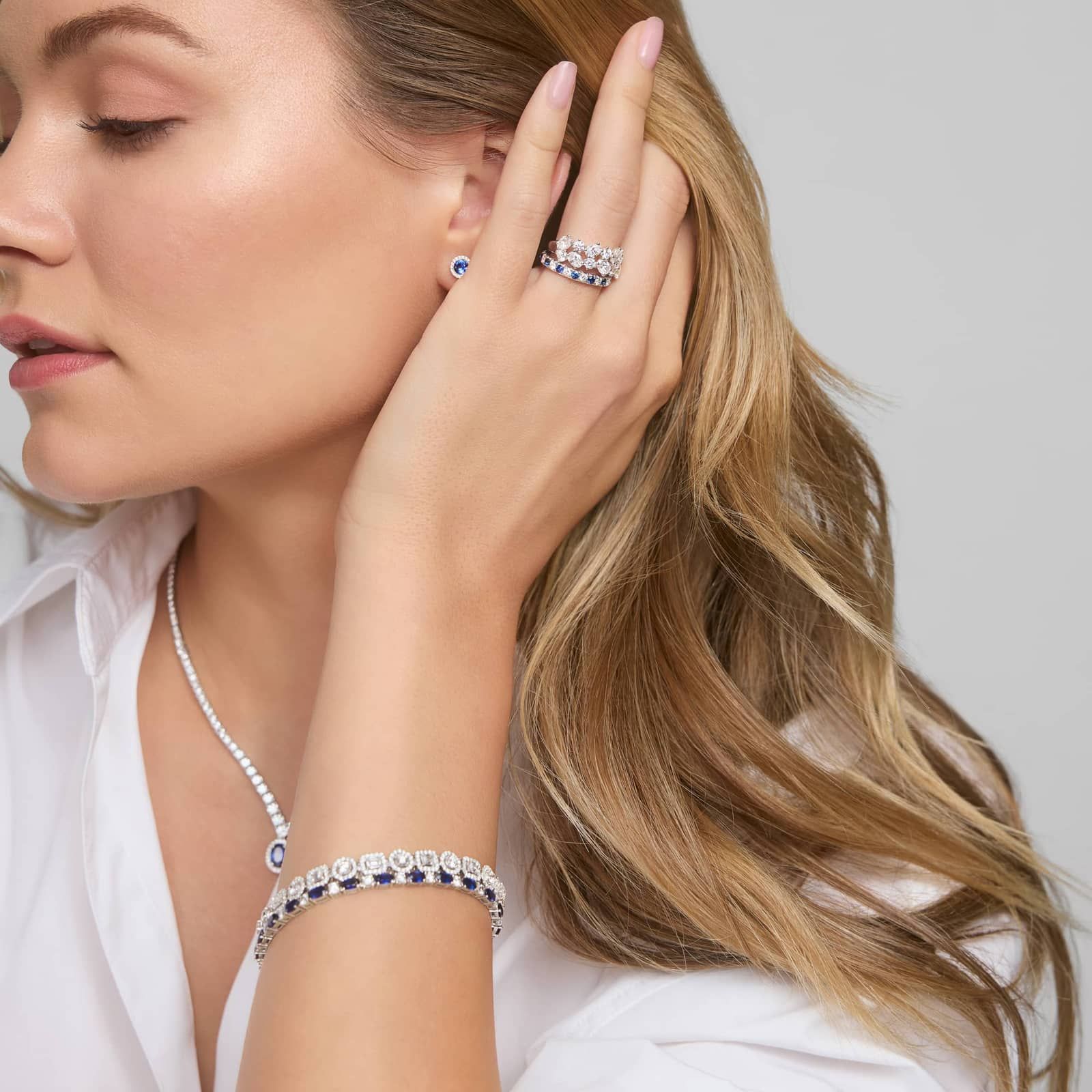 Diamond and Oval Shaped Blue Sapphire Bracelet in 14K White Gold