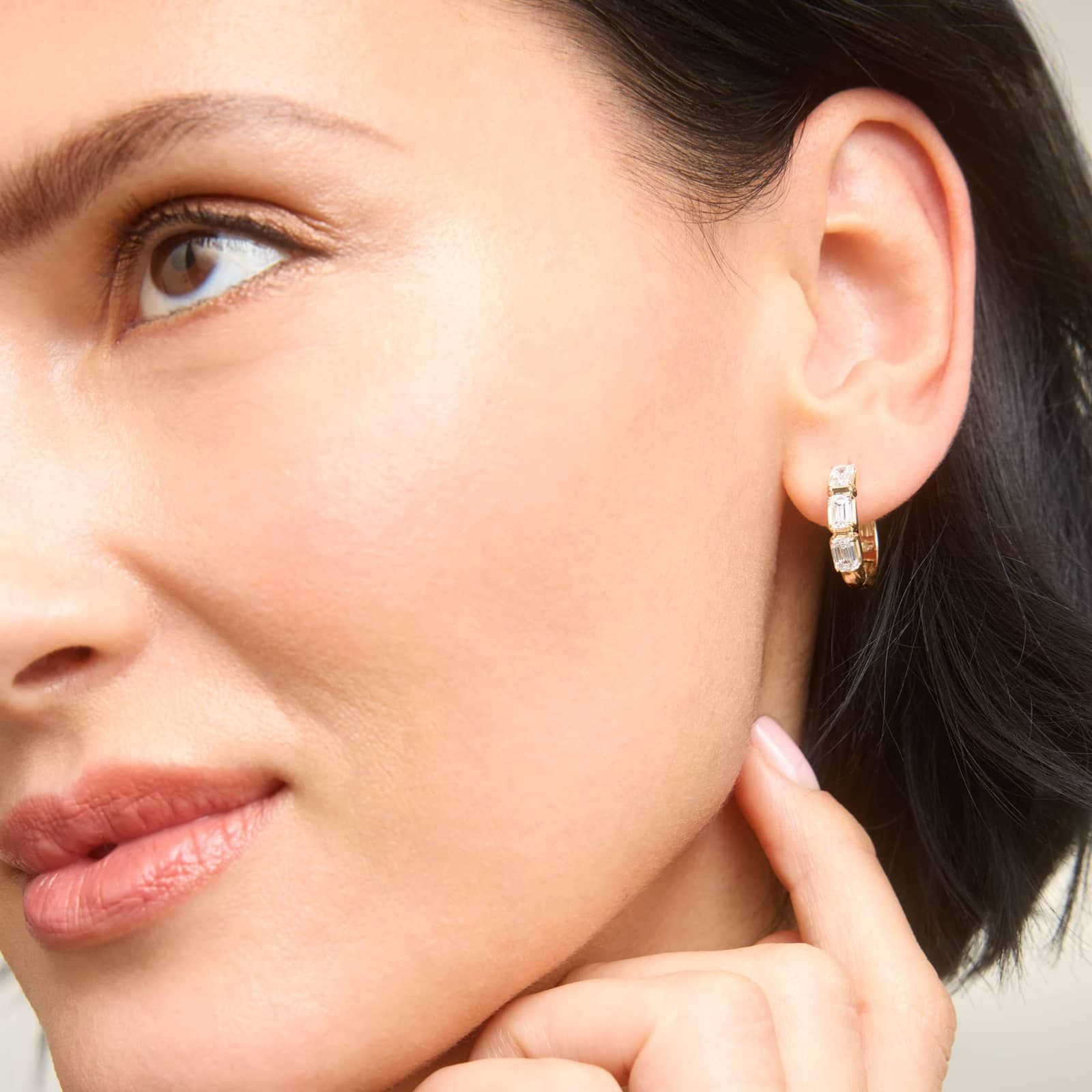 3 Stone Diamond Huggie Earrings with 2 CTW Emerald Cut Lab-Grown Diamonds in 14K Yellow Gold