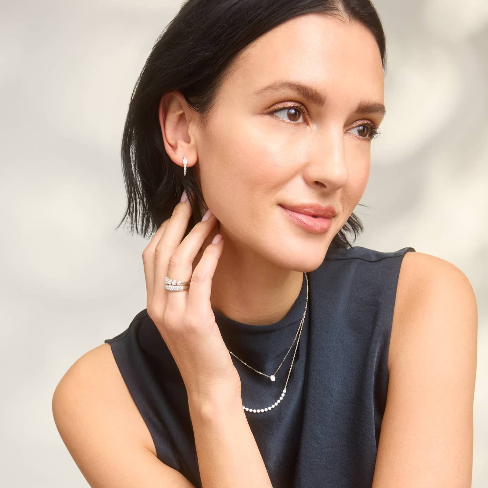 Pear Shaped Center Diamond Huggie Earrings with 1 CTW Round and Pear Shaped Lab-Grown Diamonds in 14K White Gold