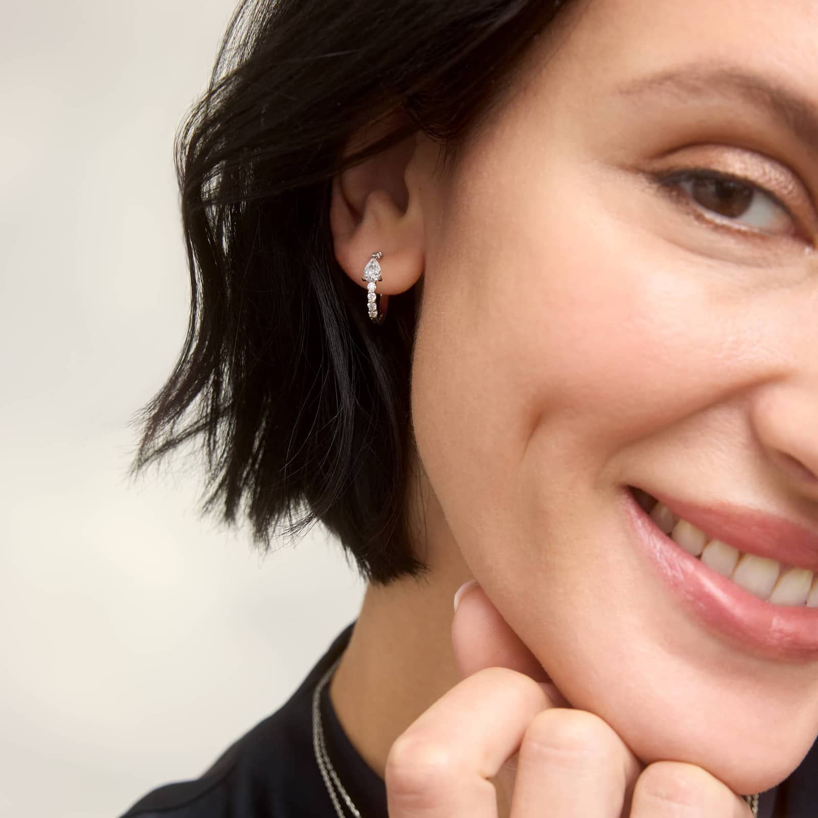 Pear Shaped Center Diamond Huggie Earrings with 1 CTW Round and Pear Shaped Lab-Grown Diamonds in 14K White Gold