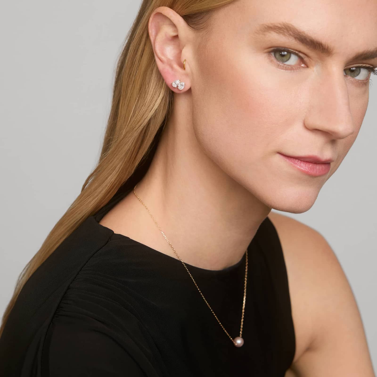 Toi et Moi Earrings with 2 CTW Oval and Pear Shaped Lab-Grown Diamonds in 14K Yellow Gold