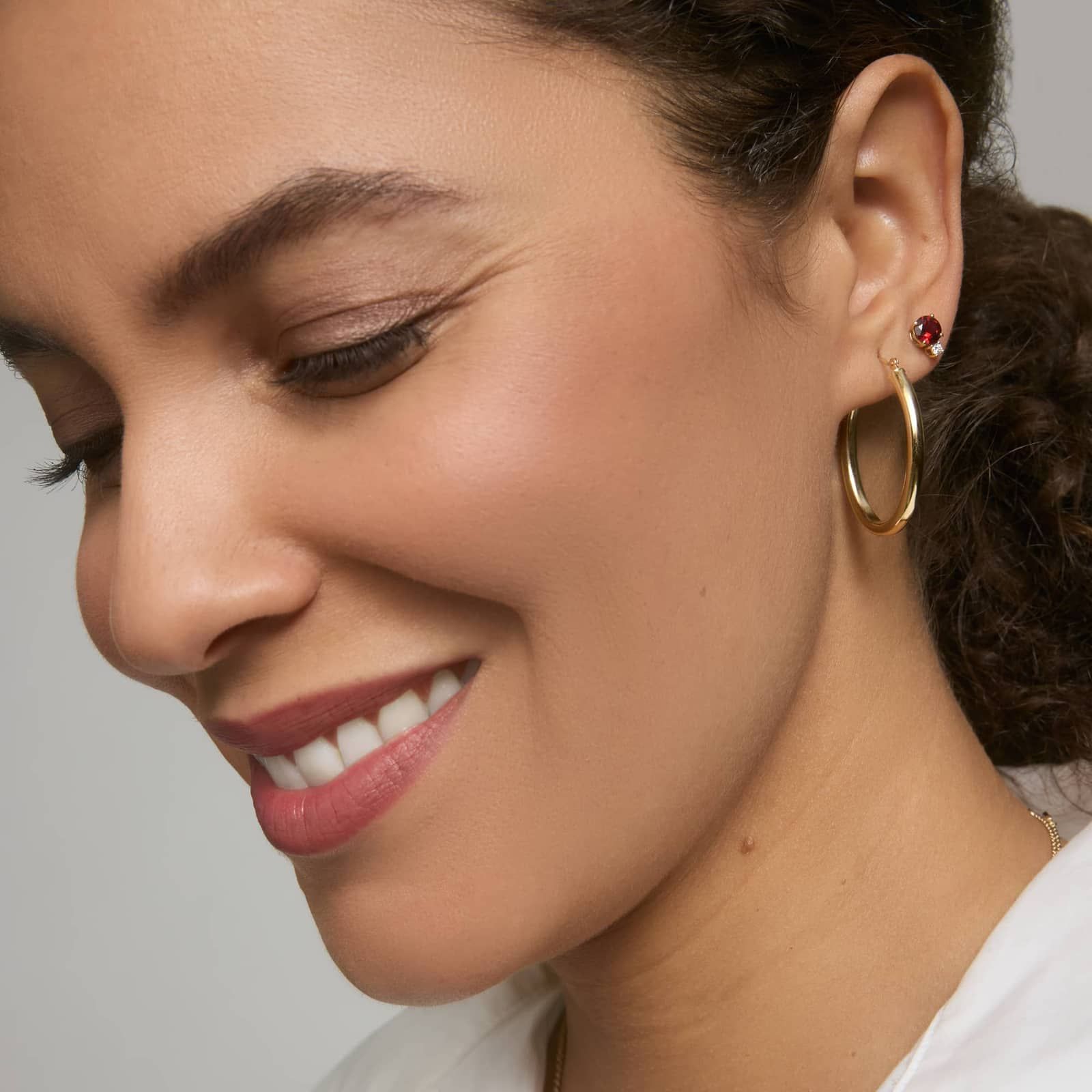 Garnet Stud Earrings with Diamond Accent in 14K Yellow Gold