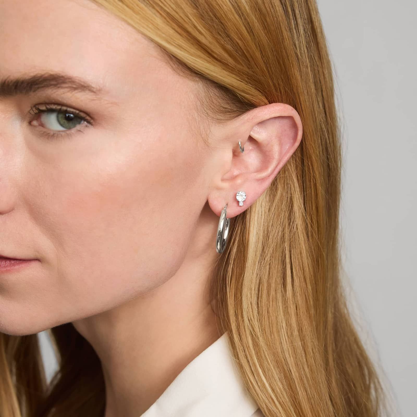 White Topaz Stud Earrings with Diamond Accent in 14K White Gold