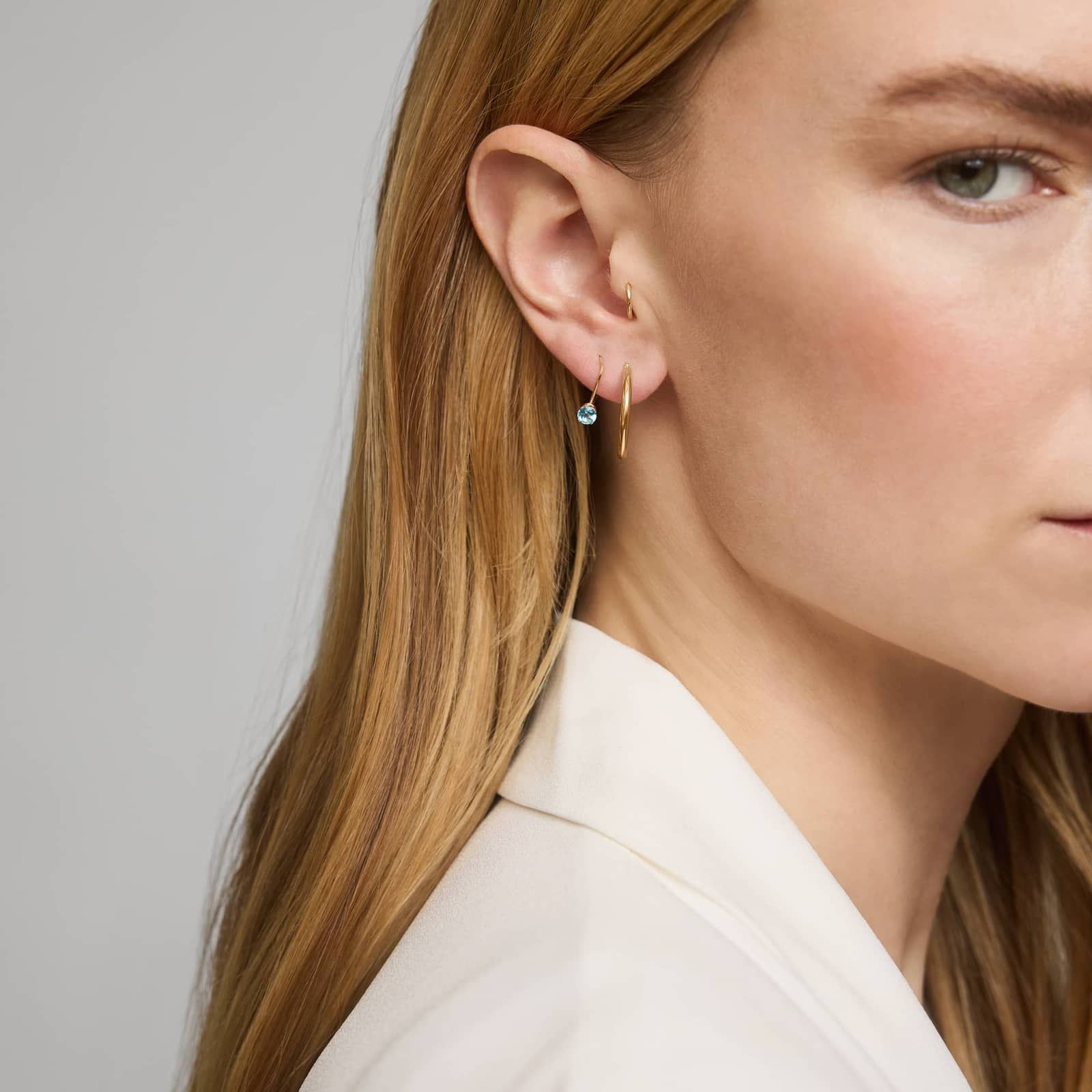 Blue Topaz Leverback Earrings in 14K Yellow Gold