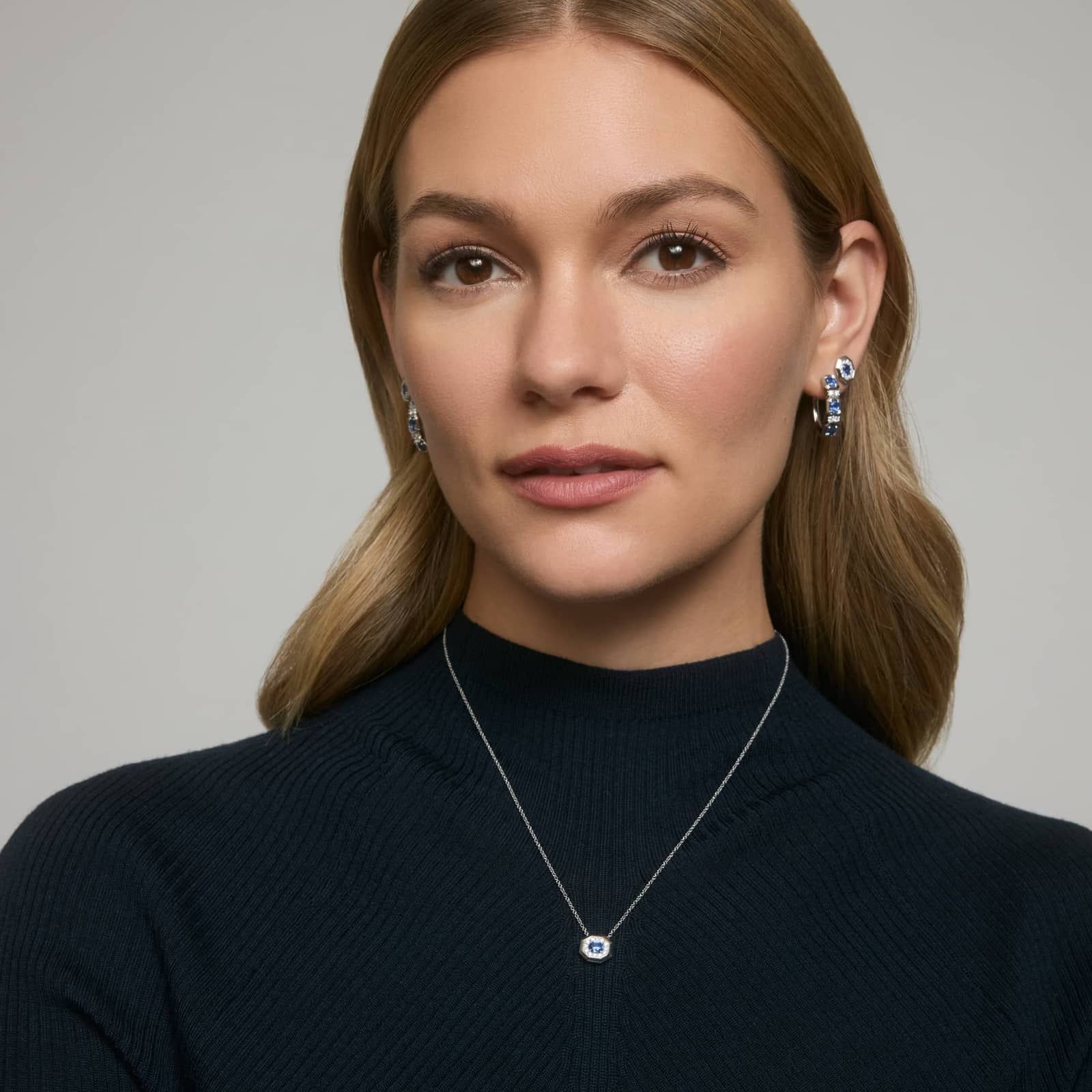 Oval Cut Blue Sapphire and Diamond Hoop Earrings In 14K White Gold