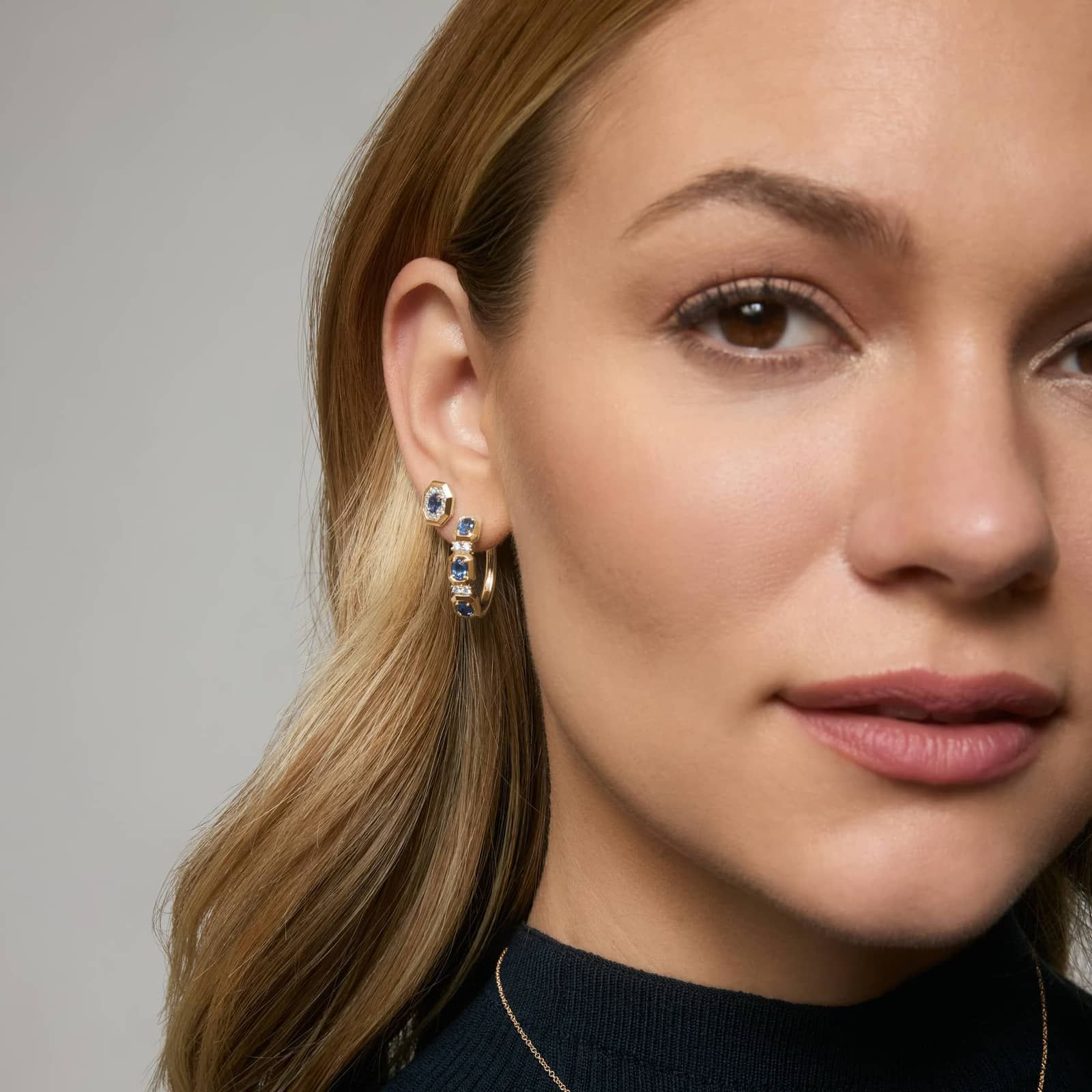 Oval Cut Blue Sapphire and Diamond Hoop Earrings In 14K Yellow Gold