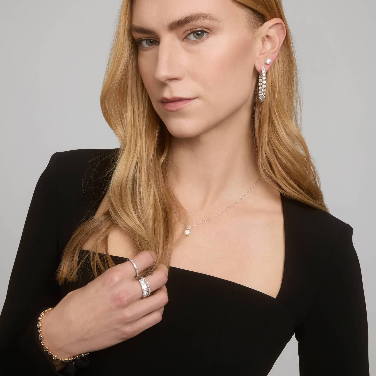 Hidden Halo Stud Earrings with 2.25 CTW Round Cut Lab-Grown Diamonds in 14K White Gold