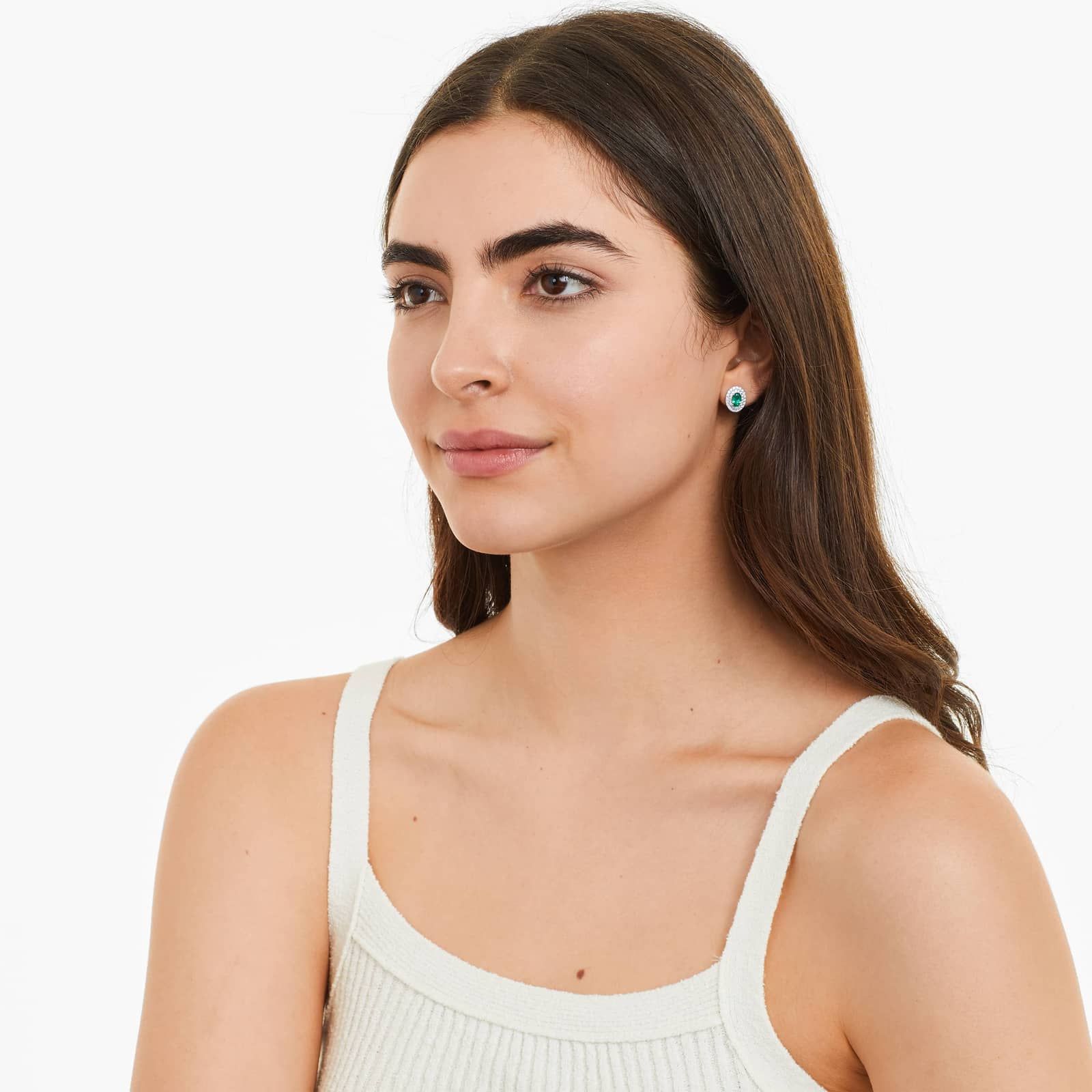 Oval Cut Emerald And Diamond Double Halo Earrings In 18K White Gold