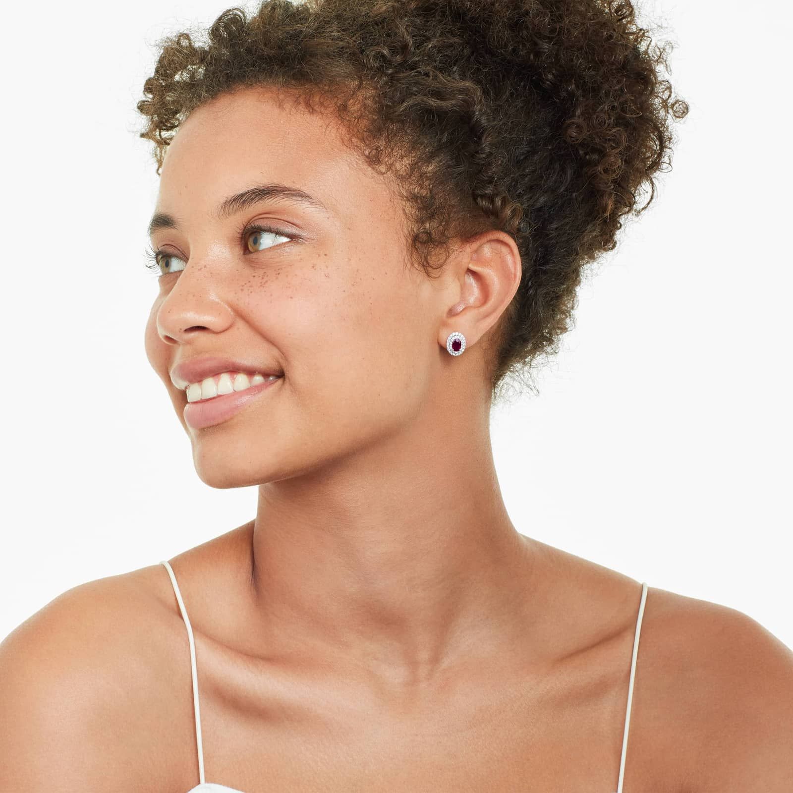 Oval Cut Ruby And Diamond Double Halo Earrings In 18K White Gold