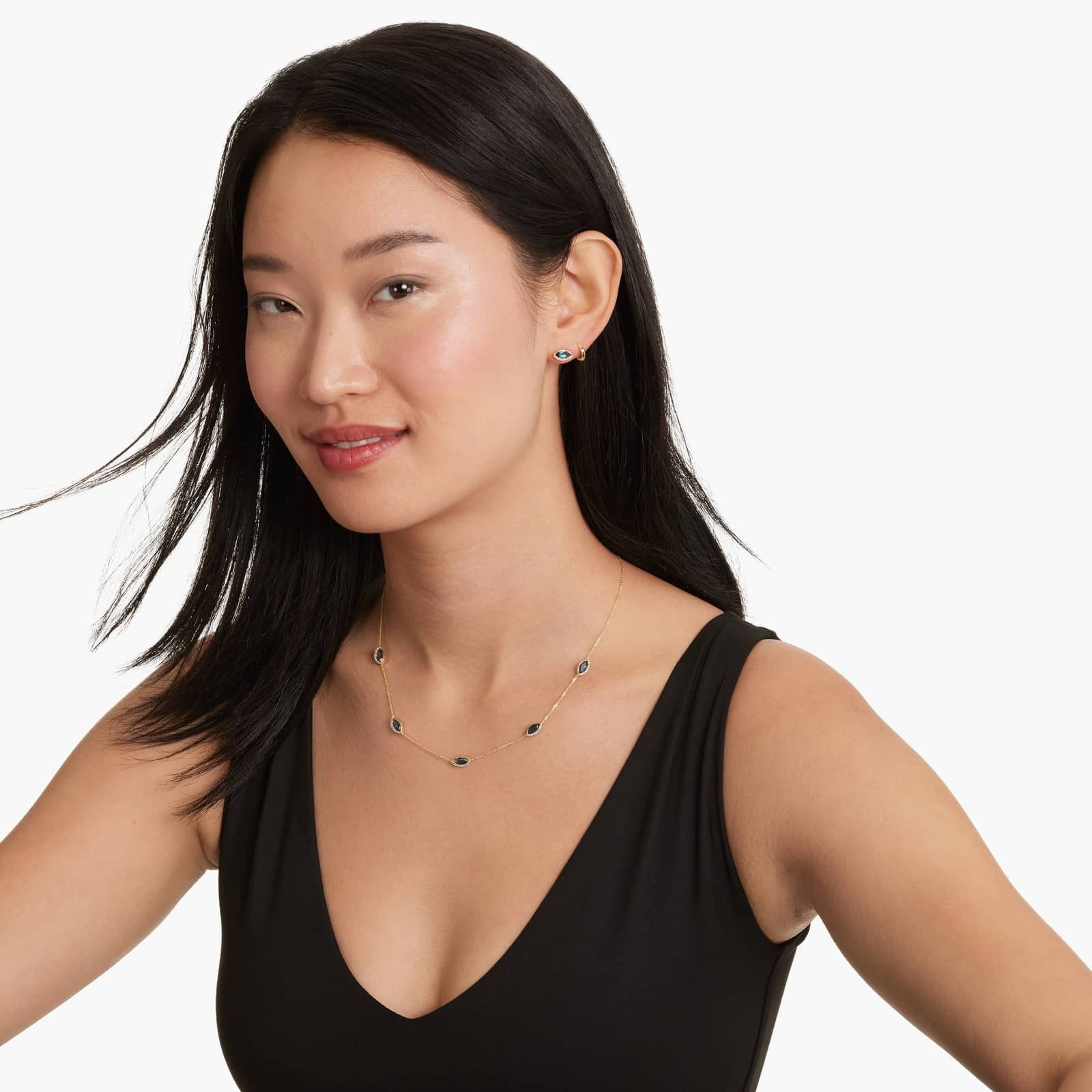 Radiant Reflections Marquise Cut Blue Topaz Earrings In 14K Yellow Gold