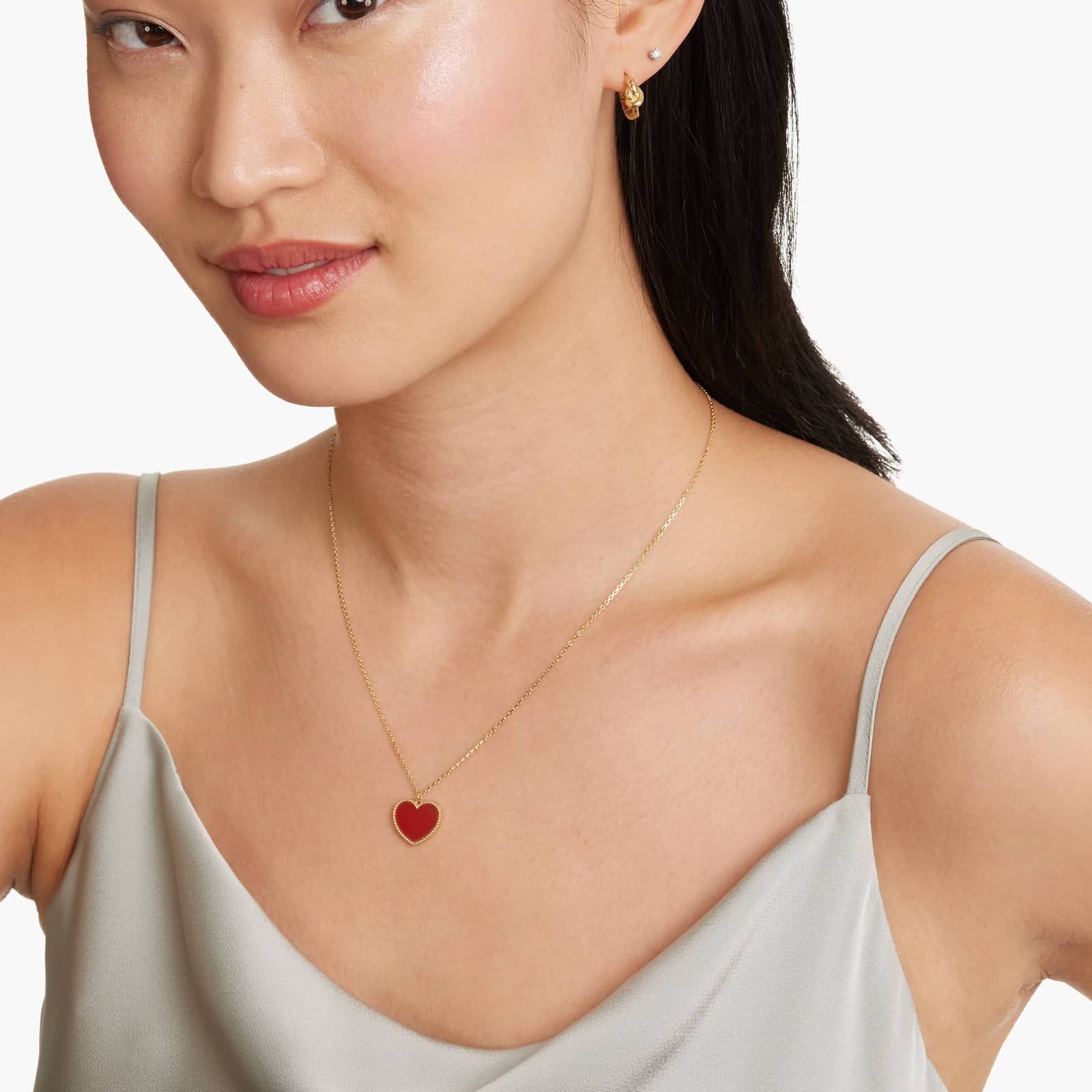 Golden Hour Love Knot Huggie Hoop Earrings In 14K Yellow Gold