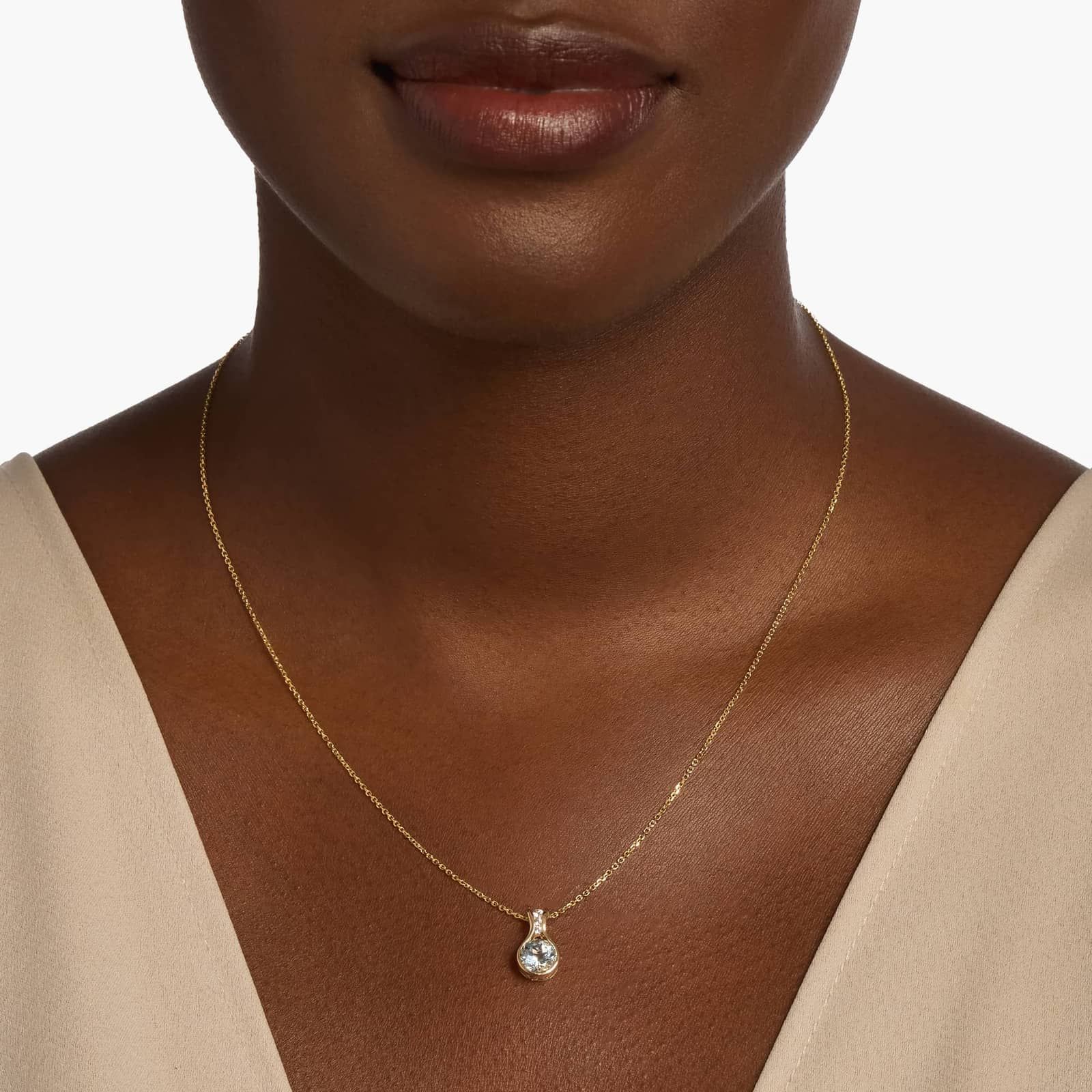 Round Aquamarine Pendant in 14k Yellow Gold (7mm)