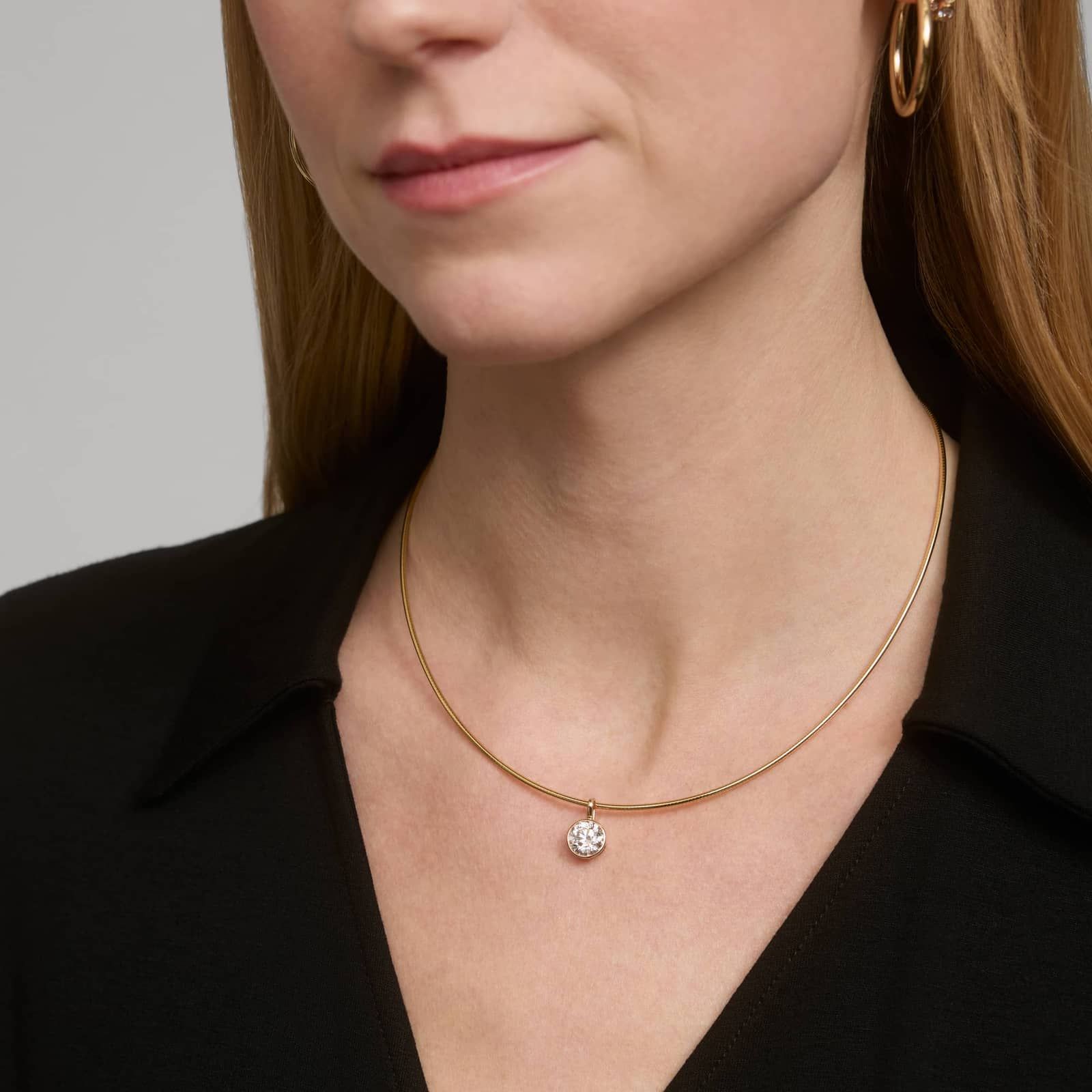 Bezel Set Round Cut 2 CTW Lab-Grown Diamond Pendant In 14K Yellow Gold