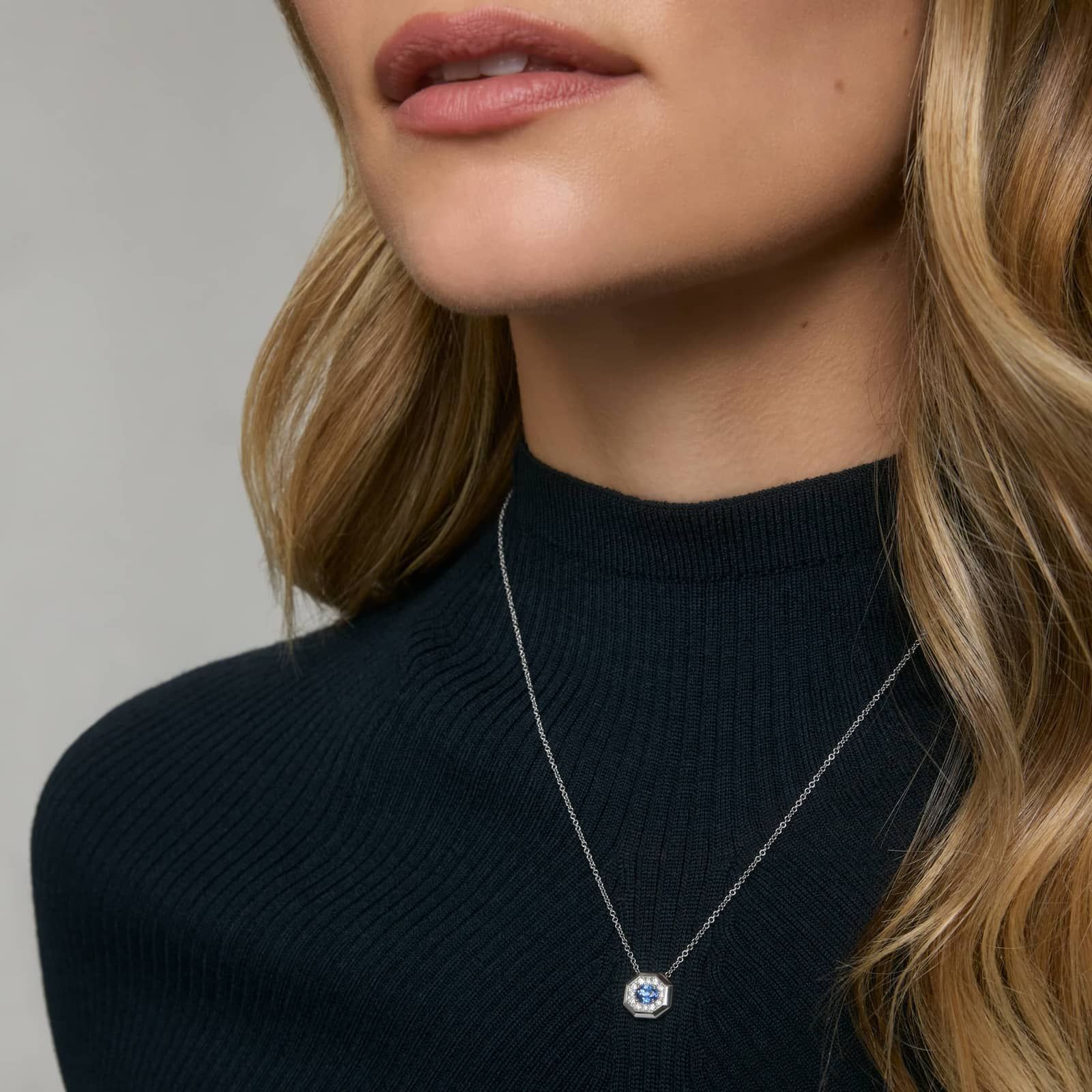 Oval Cut Blue Sapphire and Pavé Diamond Pendant Necklace In 14K White Gold