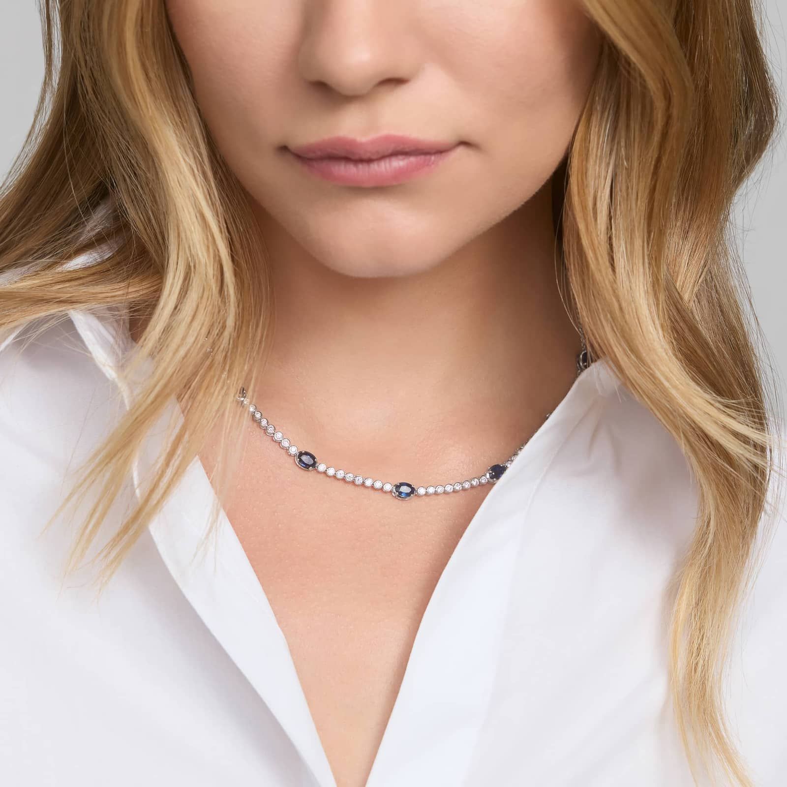 Necklace with Oval Blue Sapphire Stations and 1.25 CTW Round Cut Lab-Grown Diamonds in 14K White Gold
