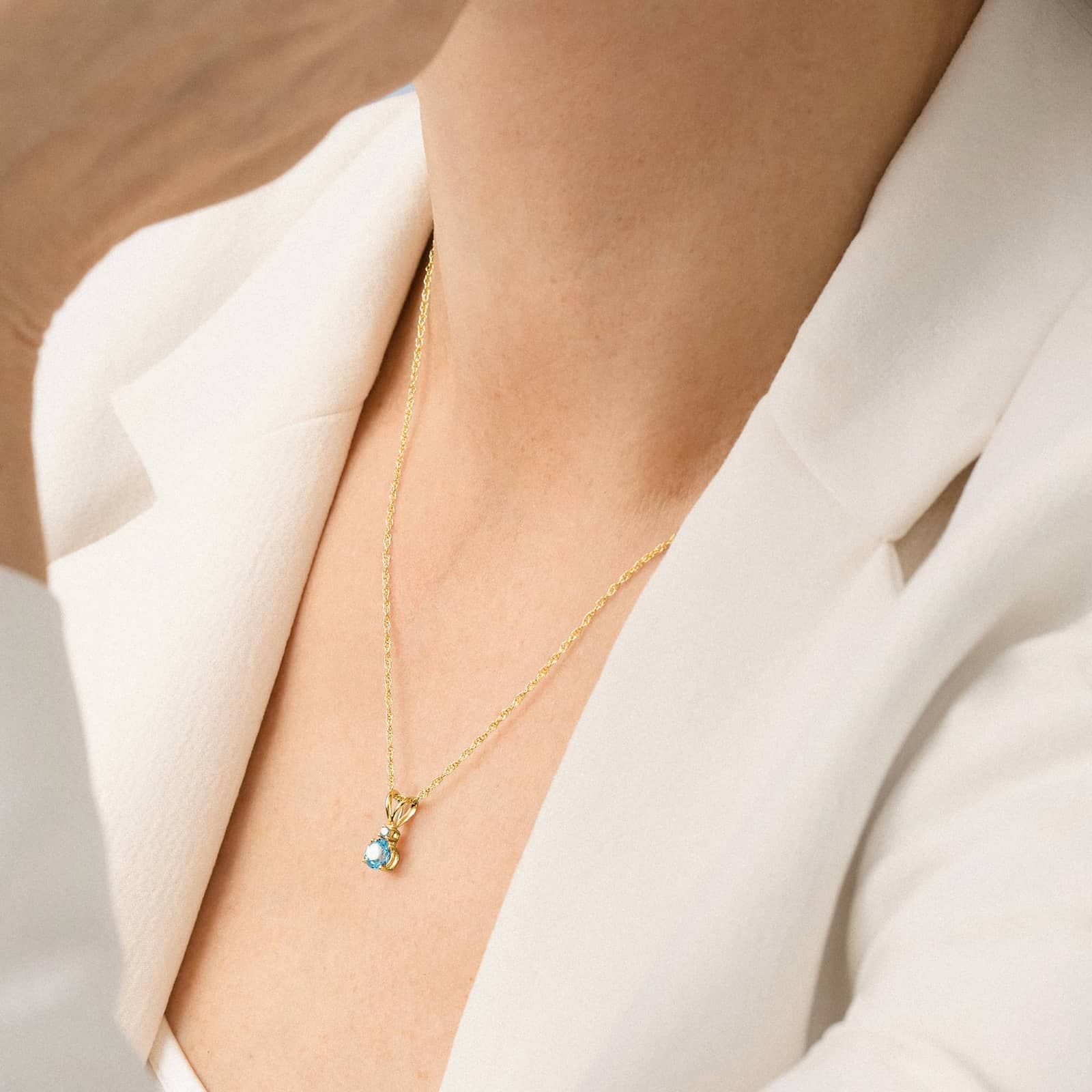 Blue Topaz Necklace Diamond Accent in 14K Yellow Gold (1/50 ct. tw.)