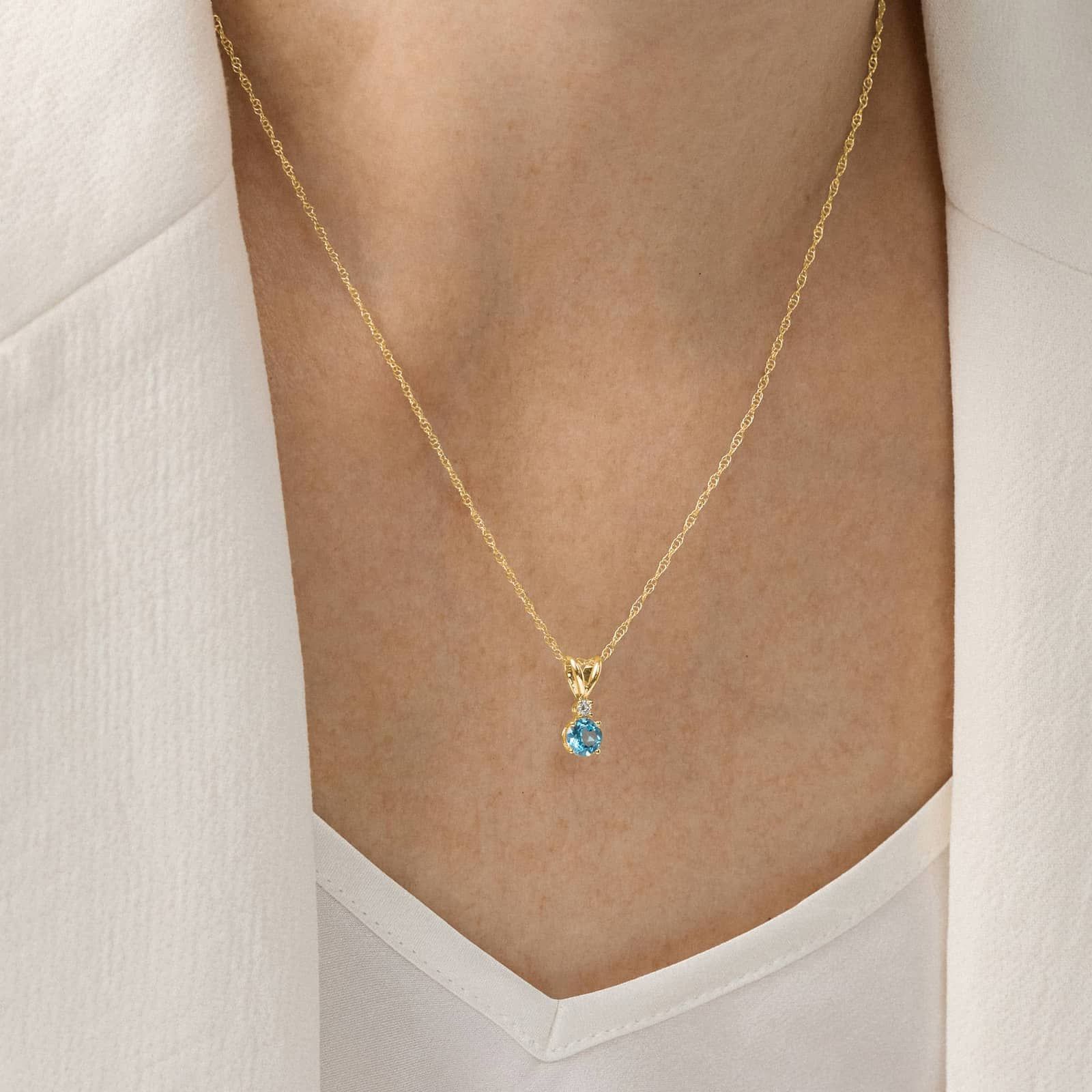 Blue Topaz Necklace Diamond Accent in 14K Yellow Gold (1/50 ct. tw.)