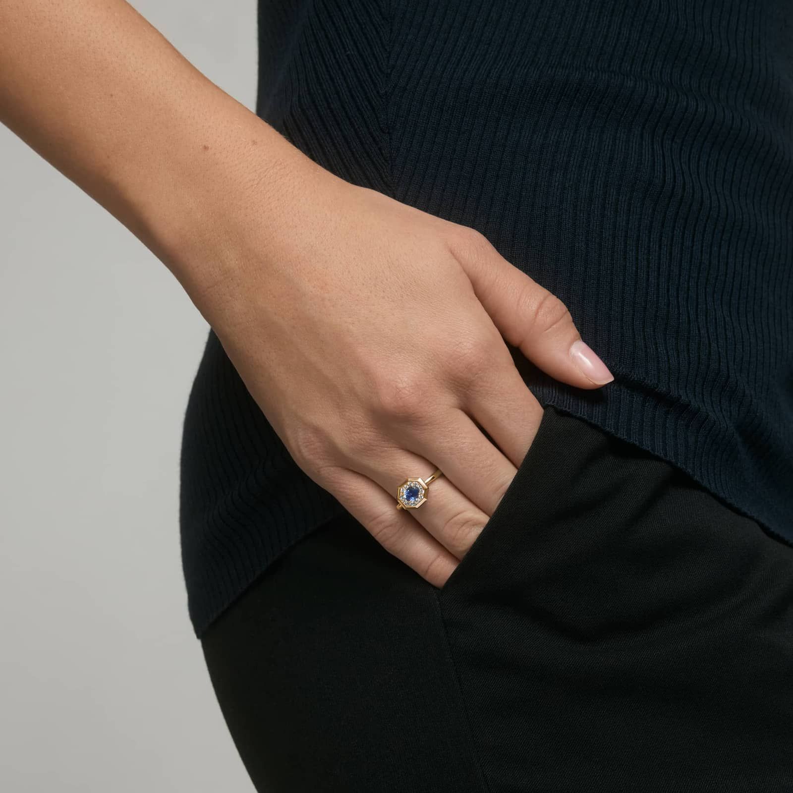 East-West Oval Cut Blue Sapphire and Pavé Diamond Ring In 14K Yellow Gold