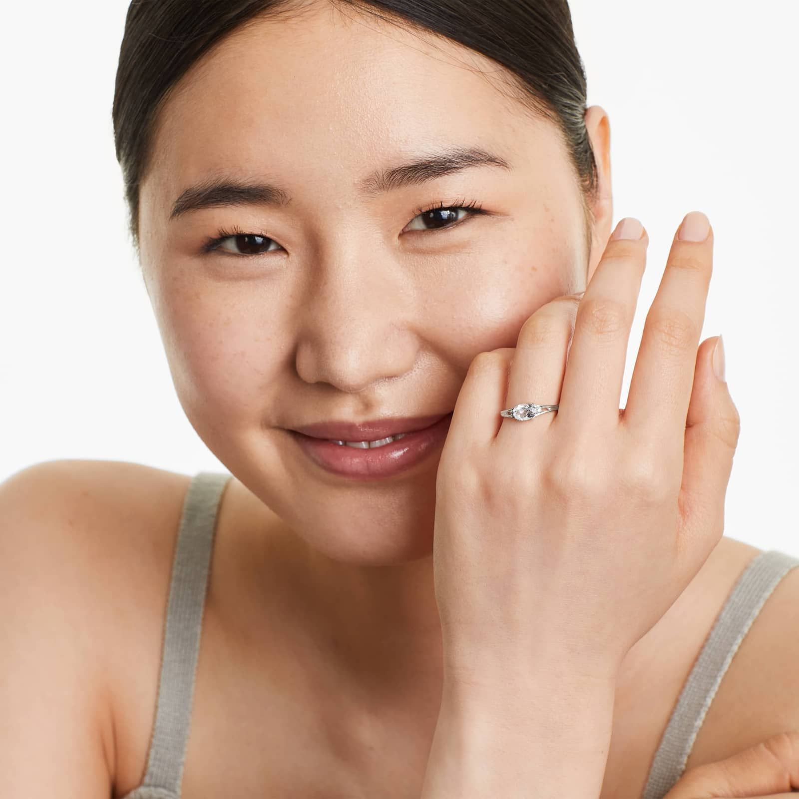 Oval White Topaz And Diamond Accent Birthstone Ring In 14K White Gold