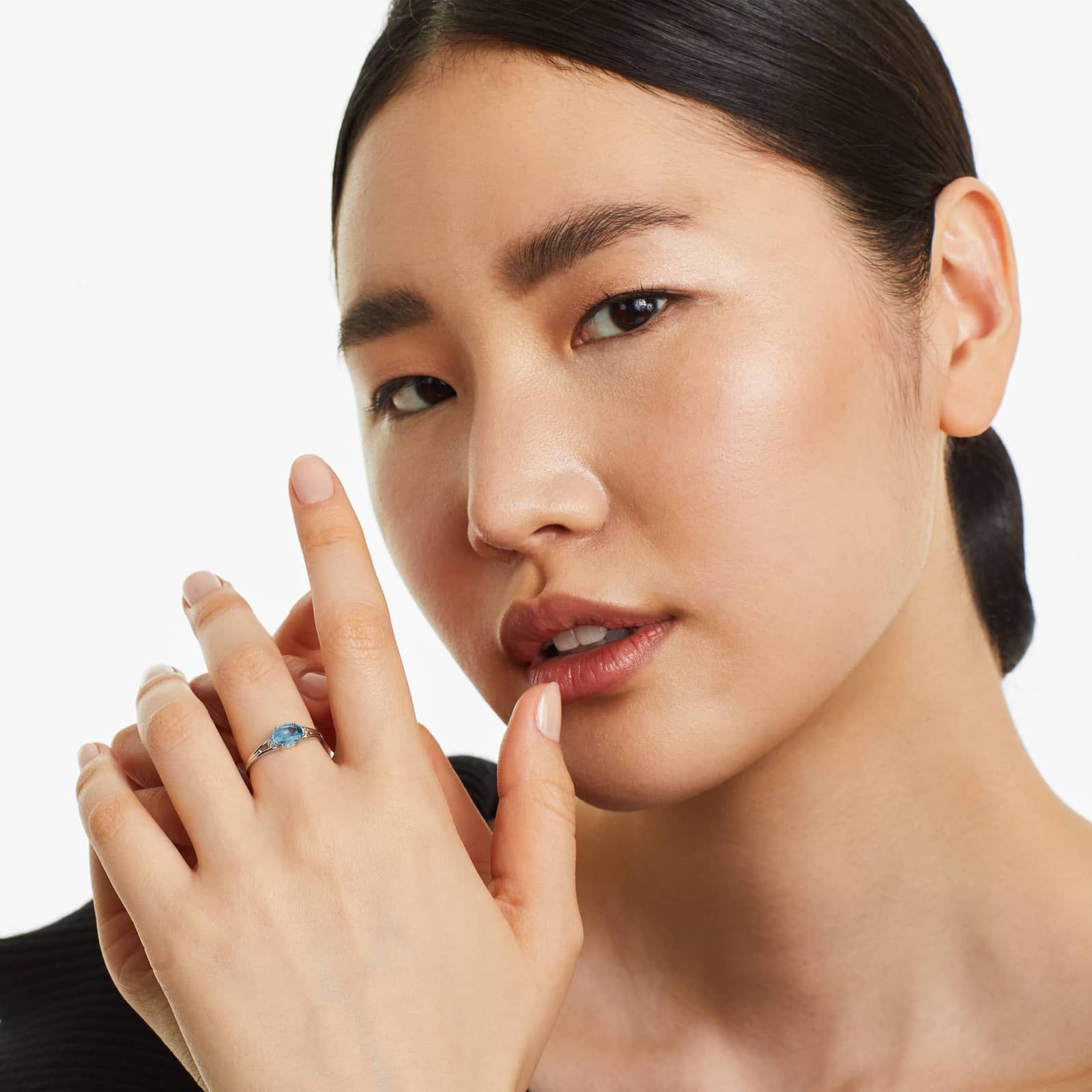 Oval Blue Topaz And Diamond Accent Birthstone Ring In 14K White Gold