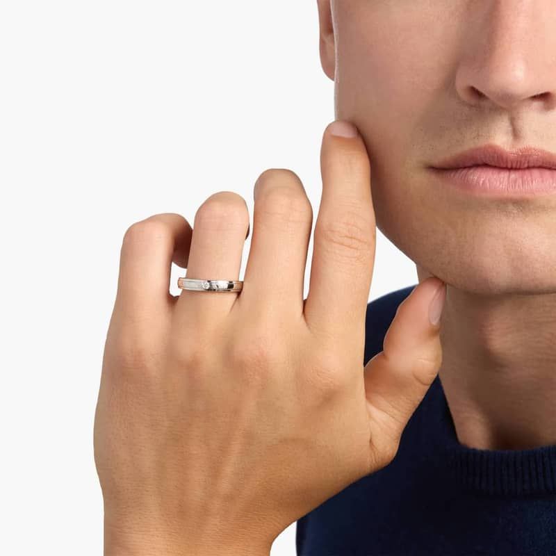 Diagonal Channel Set Round Solitaire Diamond Ring in Platinum (.05 ct. tw.)