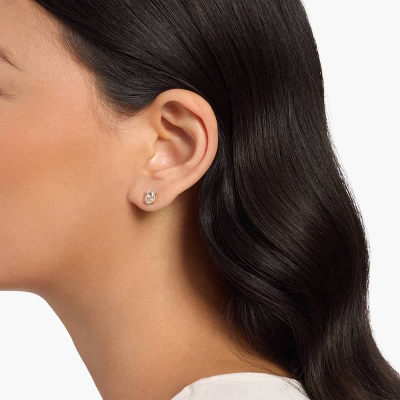 Oval Birthstone White Topaz Stud Earrings in 14K Yellow Gold (7x5mm)