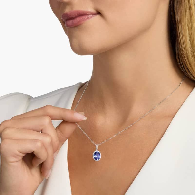 Oval Tanzanite and Diamond Halo Pendant in 14k White Gold (10x8mm)