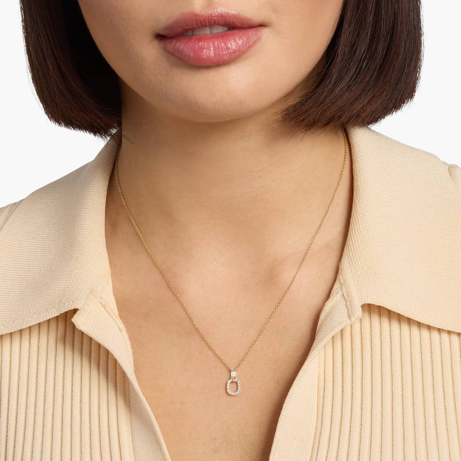 Baguette and Oval Drop Diamond Necklace in 14k Yellow Gold (1/5 ct. tw.)