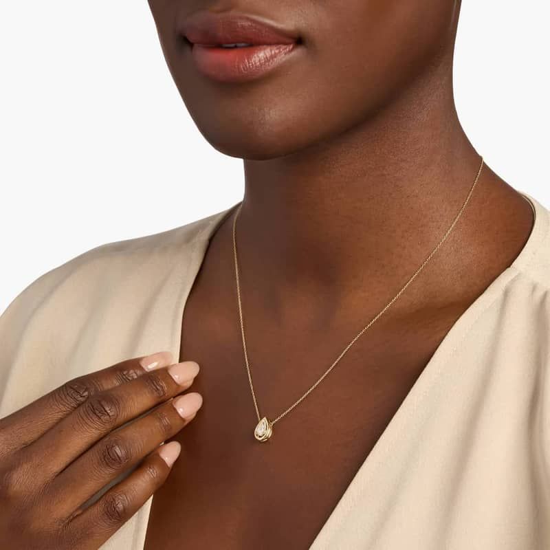 Lab Grown Diamond Pear Cut Floating Solitaire Pendant in 14K Yellow Gold (1/2 Ct. Tw.)