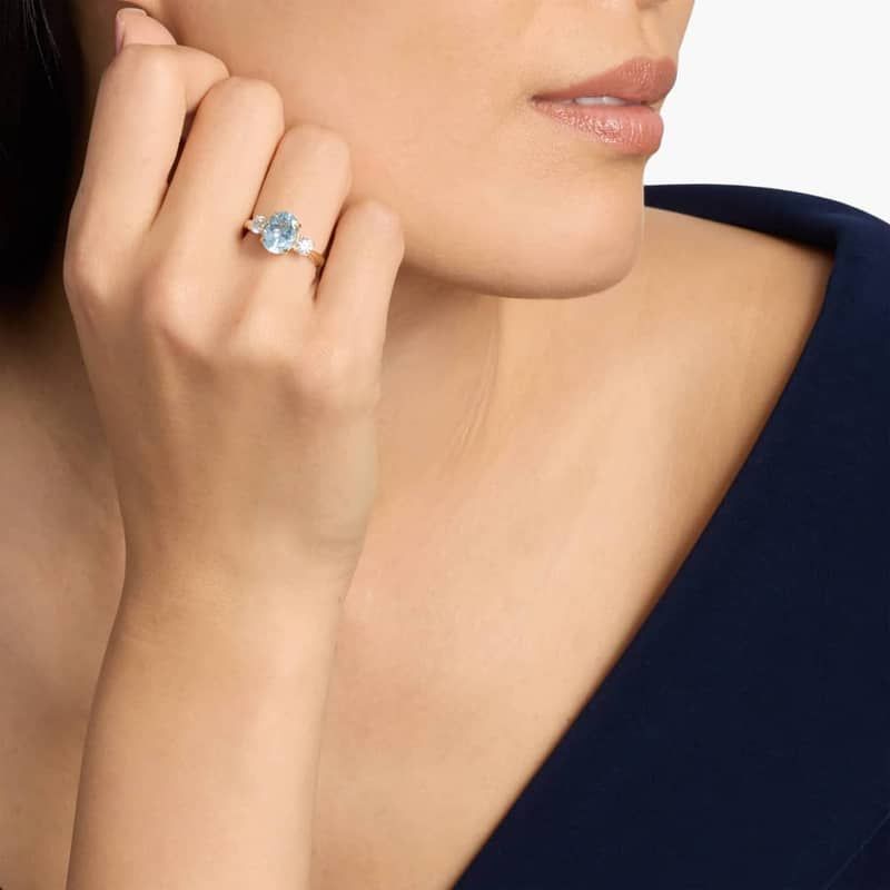 Oval Aquamarine and Diamond Sidestone Ring in 14k Yellow Gold