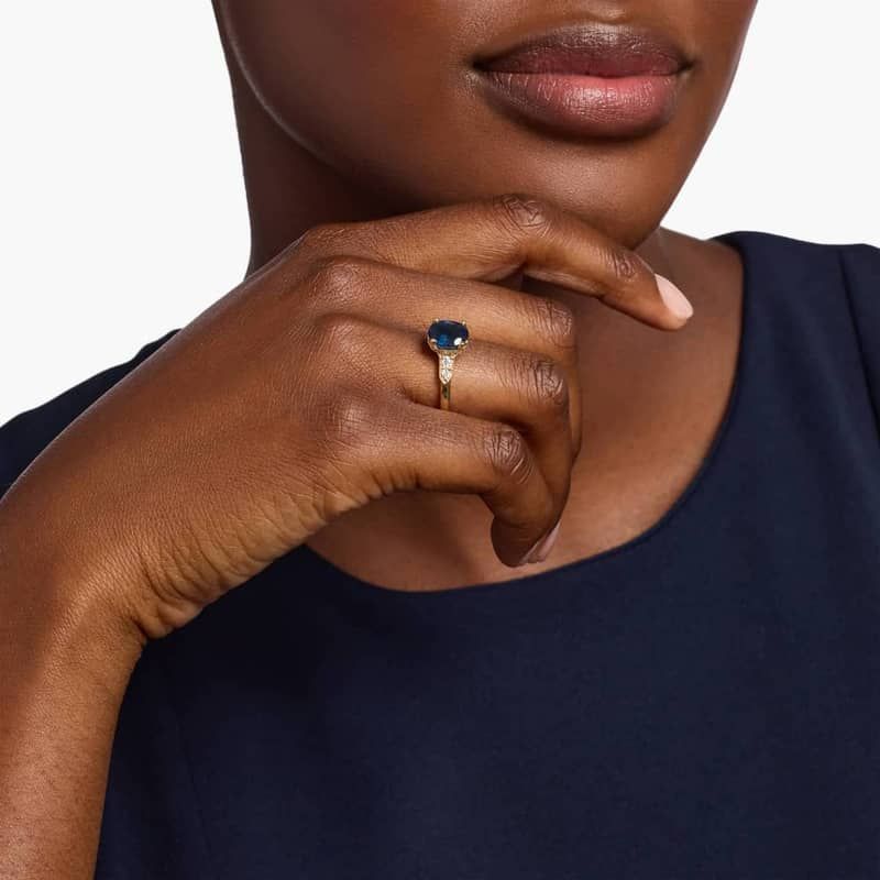 Oval Sapphire and Diamond Side Stone Ring in 14k Yellow Gold (9x7mm)