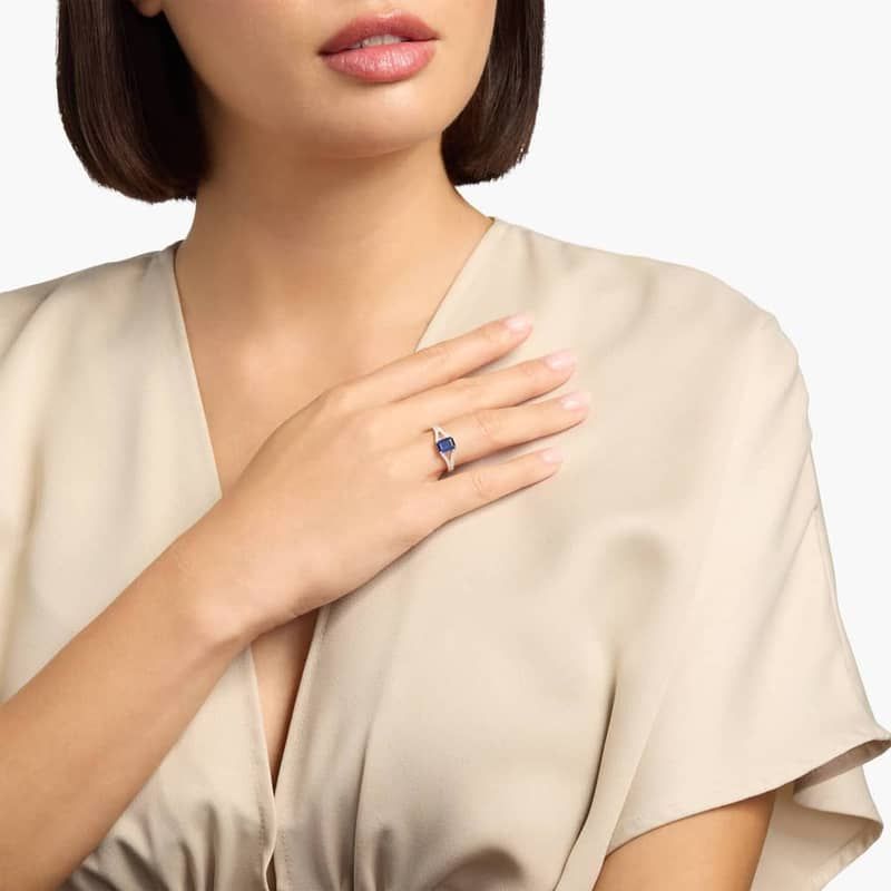 Emerald Cut Sapphire Split Shank Ring in 14k White Gold (7x5mm)
