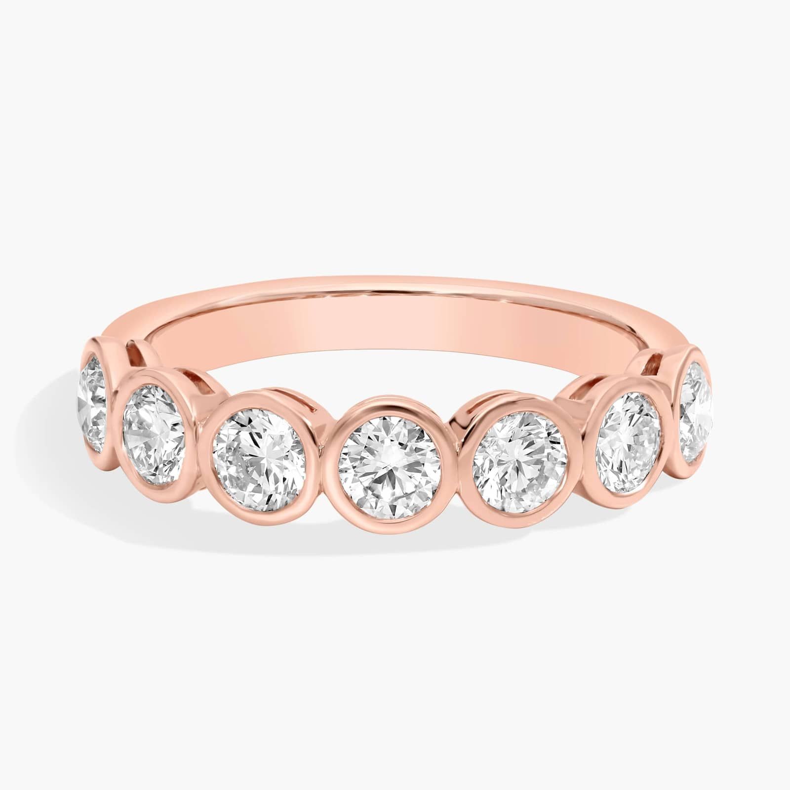 Seven Stone Bezel Anniversary Ring With 1 CTW Round Cut Diamonds in 14K Rose Gold (4.4mm)