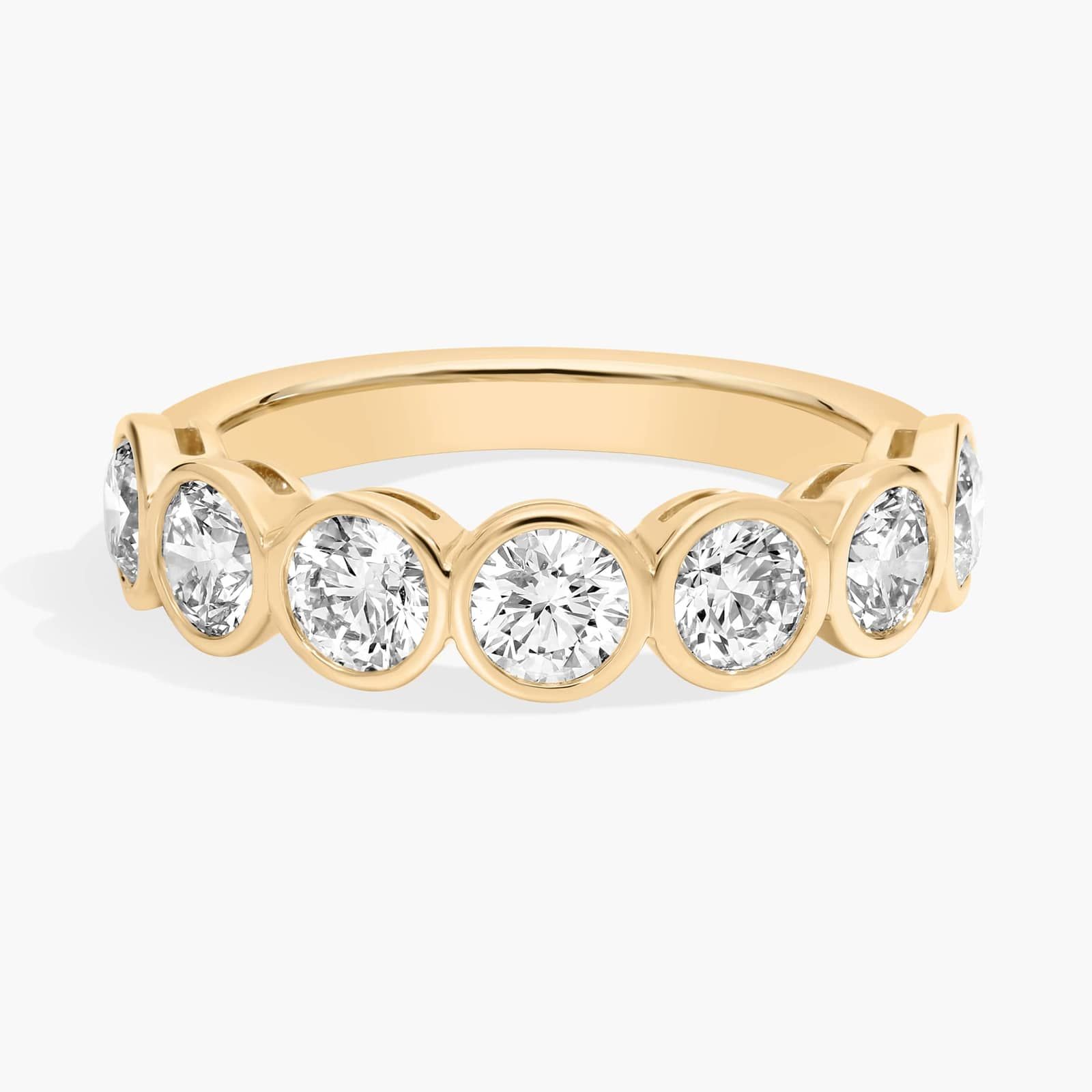 Seven Stone Bezel Anniversary Ring With 1.5 CTW Round Cut Diamonds in 14K Yellow Gold (4.65mm)