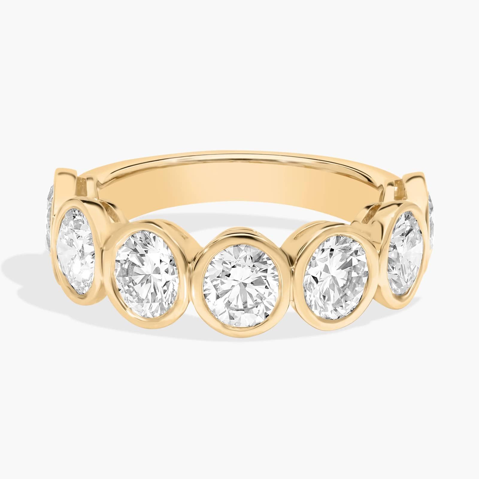 Seven Stone Bezel Anniversary Ring With 3 CTW Round Cut Diamonds in 14K Yellow Gold (5.6mm)