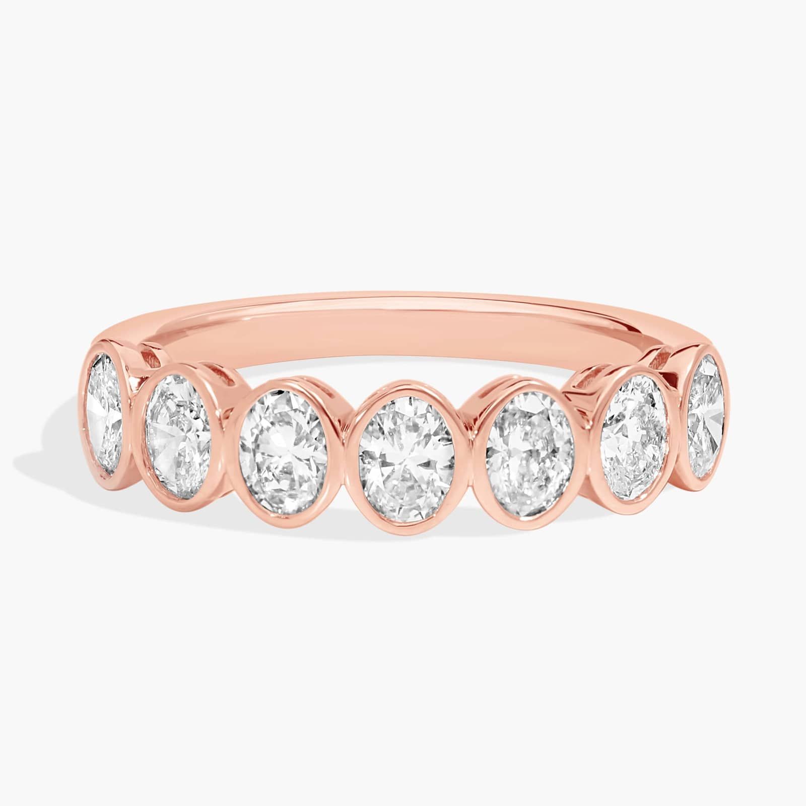 Seven Stone Bezel Anniversary Ring With 1 CTW Oval Cut Diamonds in 14K Rose Gold (4.65mm)