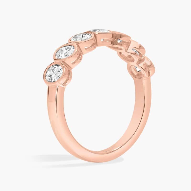Seven Stone Bezel Anniversary Ring With 1 CTW Oval Cut Diamonds in 14K Rose Gold (4.65mm)