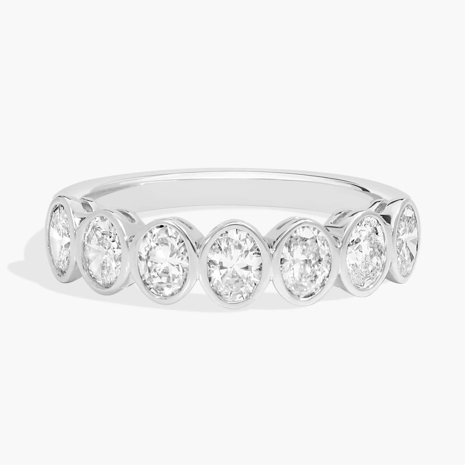 Seven Stone Bezel Anniversary Ring With 1 CTW Oval Cut Diamonds in 14K White Gold (4.65mm)