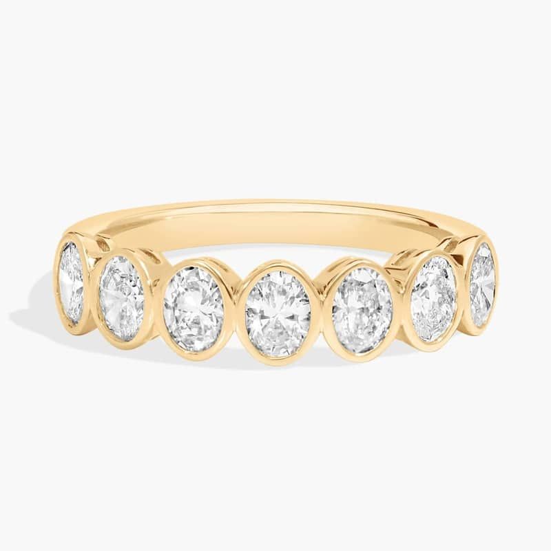 Seven Stone Bezel Anniversary Ring With 1 CTW Oval Cut Diamonds in 14K Yellow Gold (4.65mm)