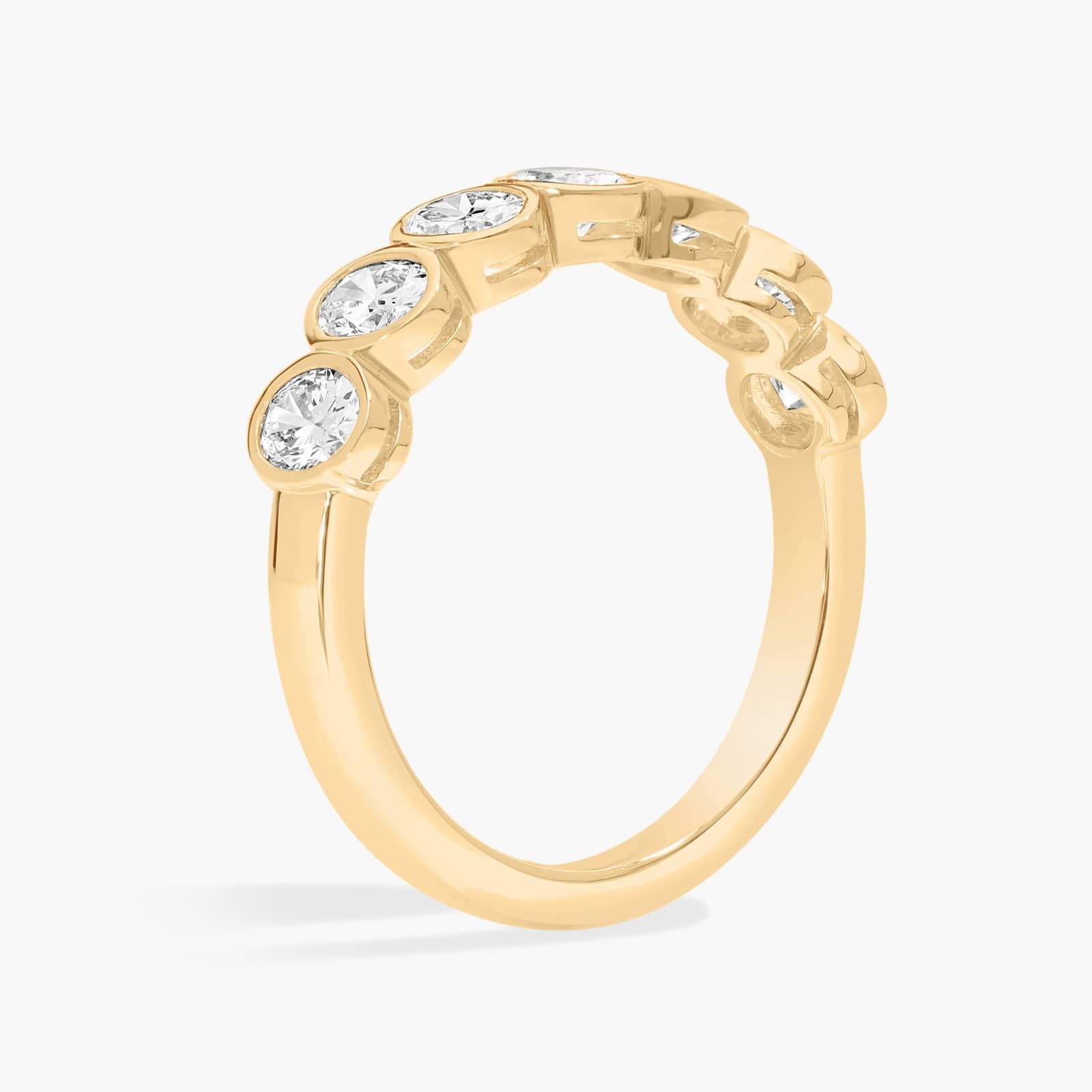 Seven Stone Bezel Anniversary Ring With 1 CTW Oval Cut Diamonds in 14K Yellow Gold (4.65mm)