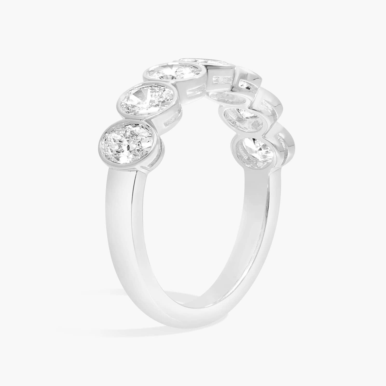 Seven Stone Bezel Anniversary Ring With 1.5 CTW Oval Cut Diamonds in 14K White Gold (5mm)