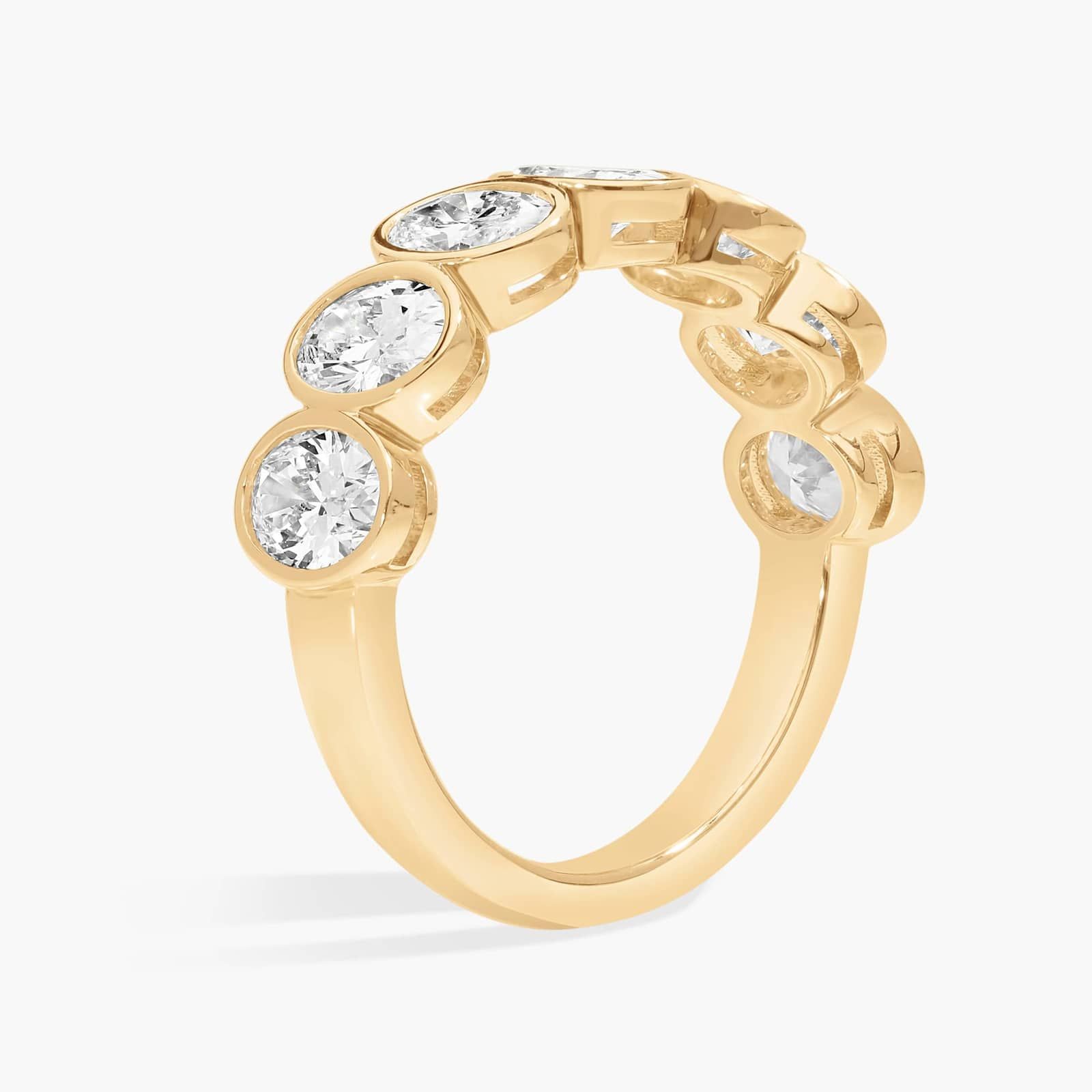 Seven Stone Bezel Anniversary Ring With 2 CTW Oval Cut Diamonds in 14K Yellow Gold (6mm)