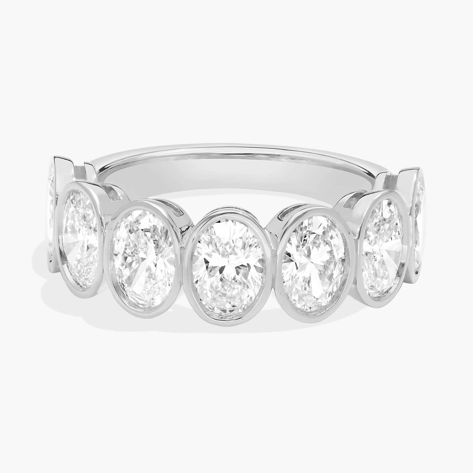 Seven Stone Bezel Anniversary Ring With 3 CTW Oval Cut Diamonds in 14K White Gold (6.7mm)