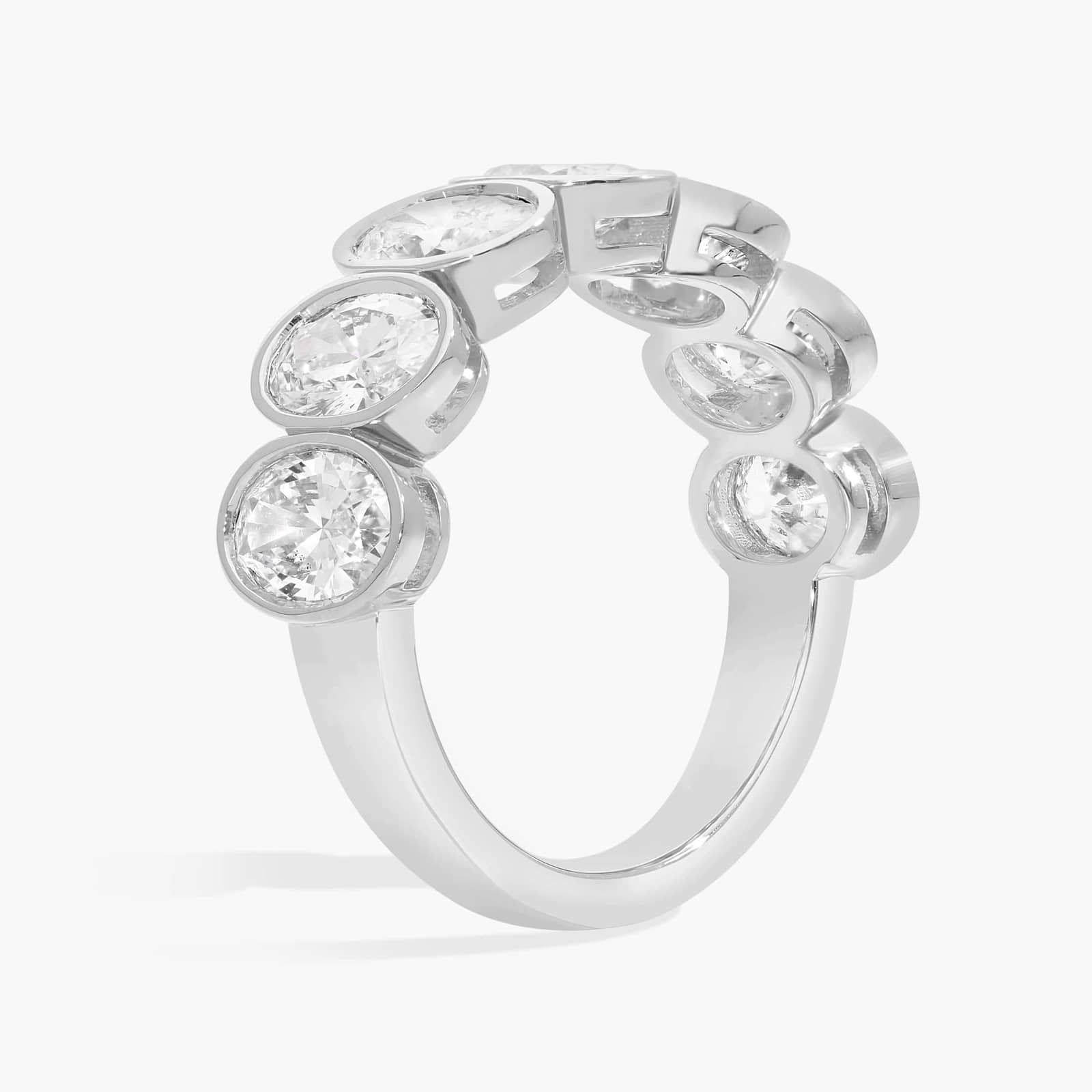 Seven Stone Bezel Anniversary Ring With 3 CTW Oval Cut Diamonds in 14K White Gold (6.7mm)
