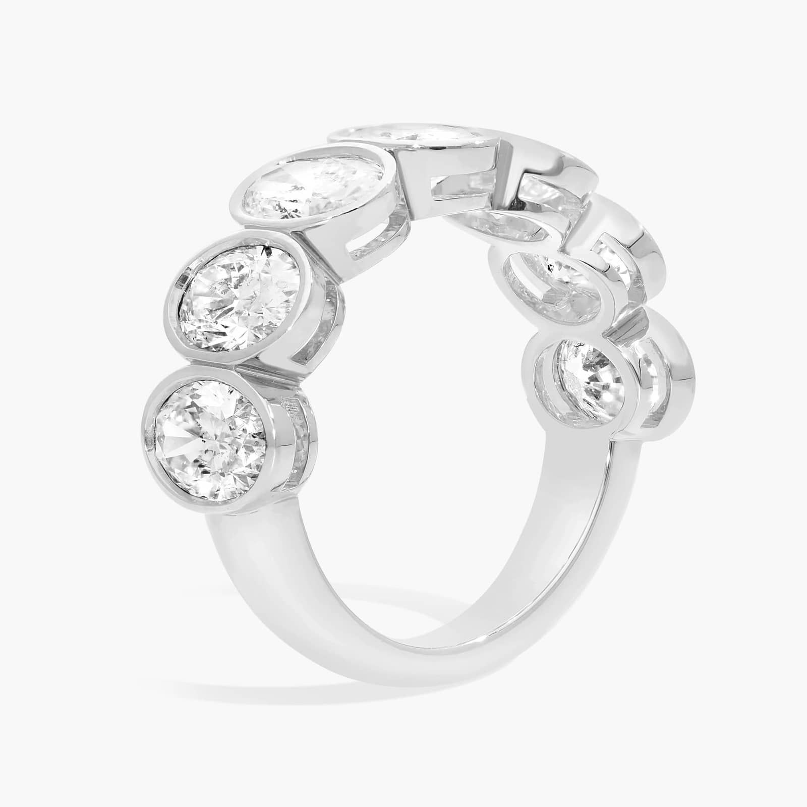 Seven Stone Bezel Anniversary Ring With 3.5 CTW Oval Cut Diamonds in 14K White Gold (7.4mm)