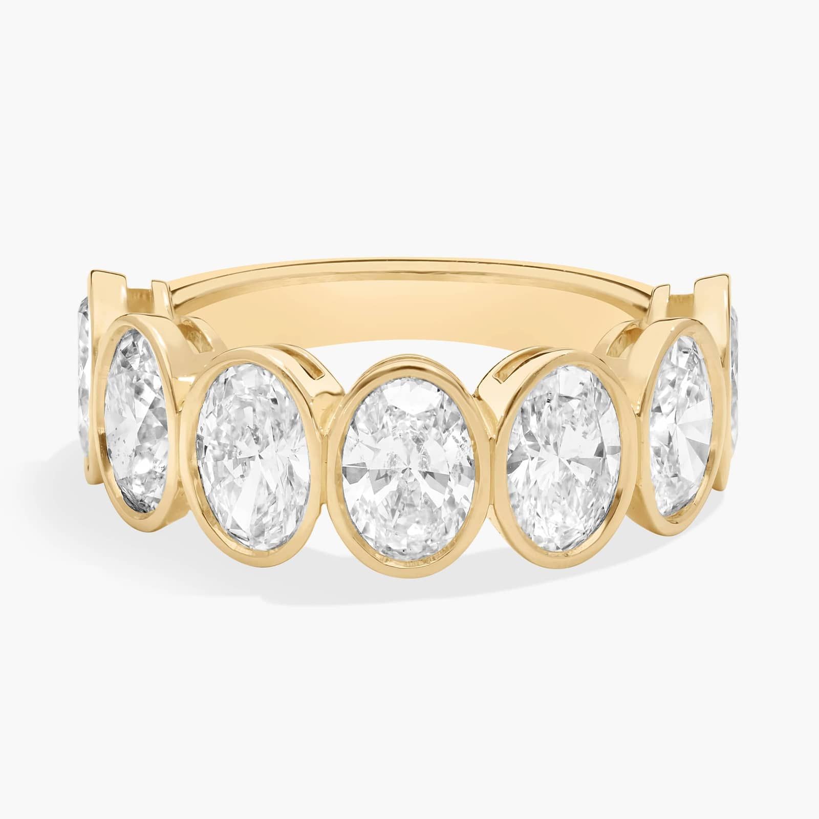 Seven Stone Bezel Anniversary Ring With 3.5 CTW Oval Cut Diamonds in 14K Yellow Gold (7.4mm)