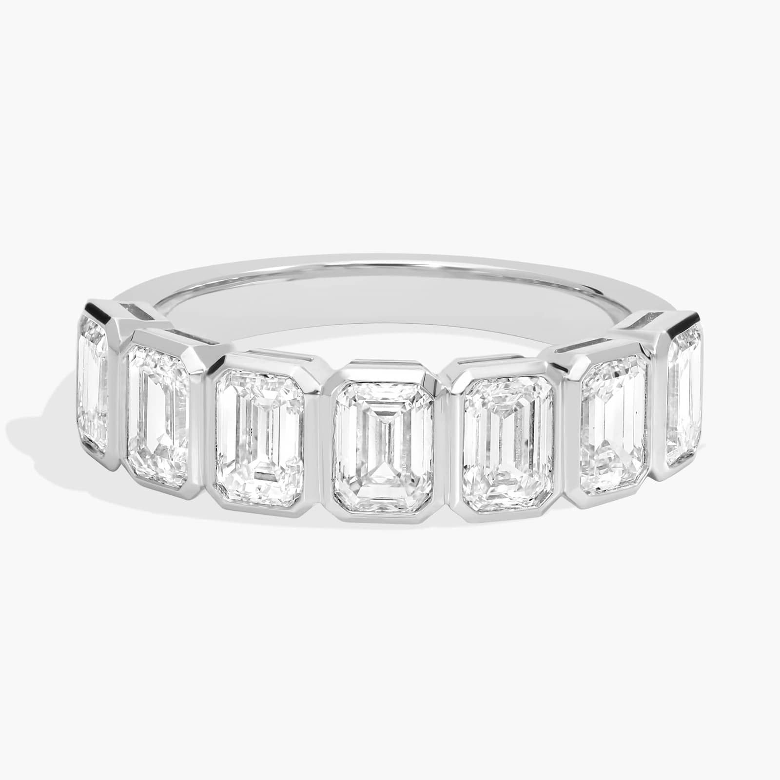 Seven Stone Bezel Anniversary Ring With 2 CTW Emerald Cut Diamonds in Platinum (5.15mm)