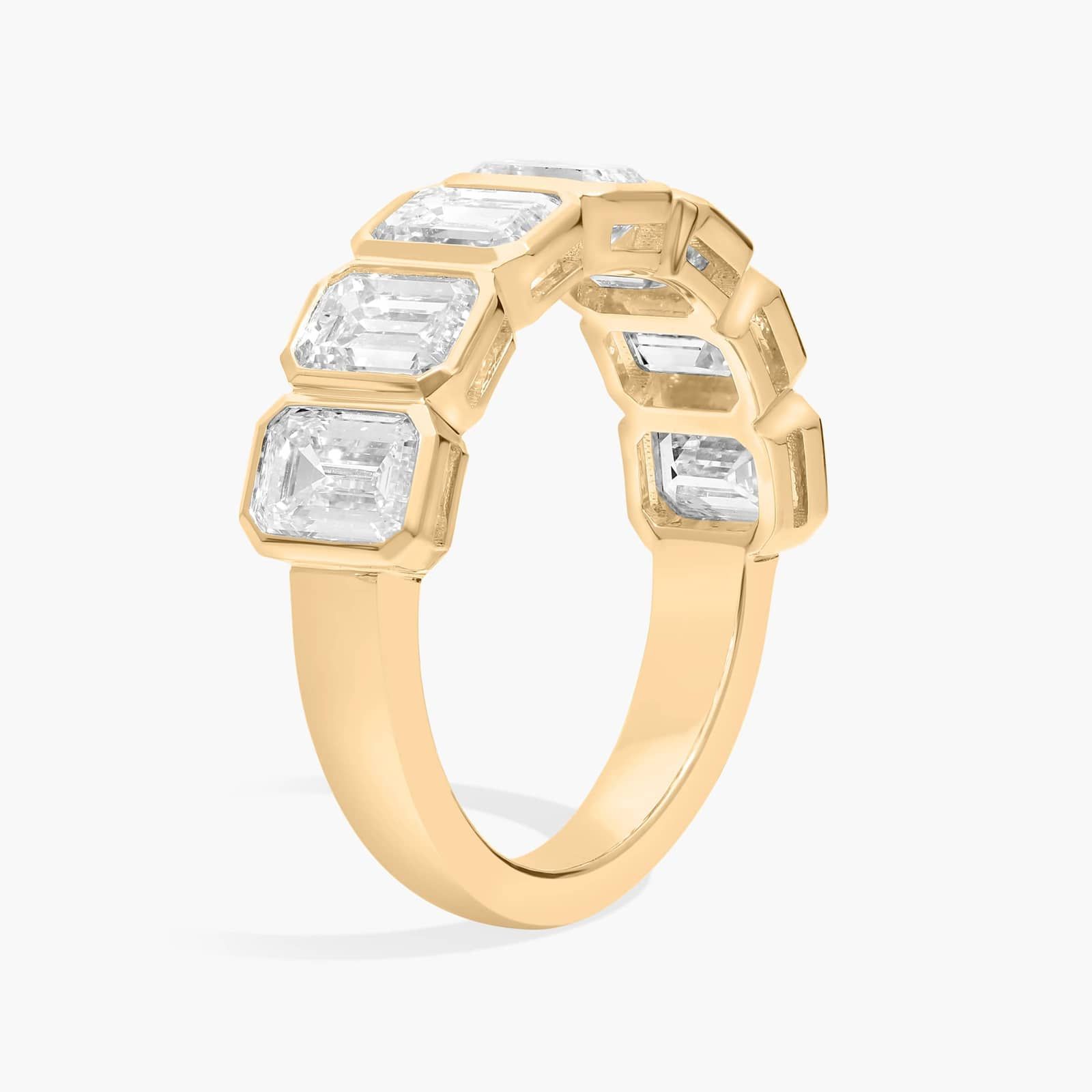 Seven Stone Bezel Anniversary Ring With 3 CTW Emerald Cut Diamonds in 14K Yellow Gold (5.95mm)