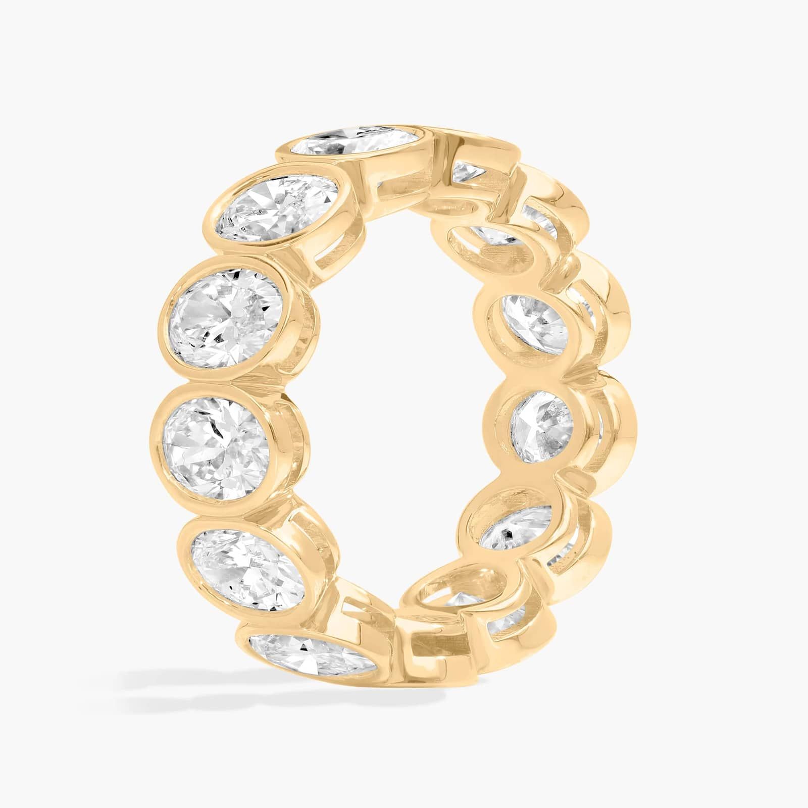 Bezel Eternity Ring With 5 CTW Oval Cut Diamonds in 14K Yellow Gold (6.7mm)
